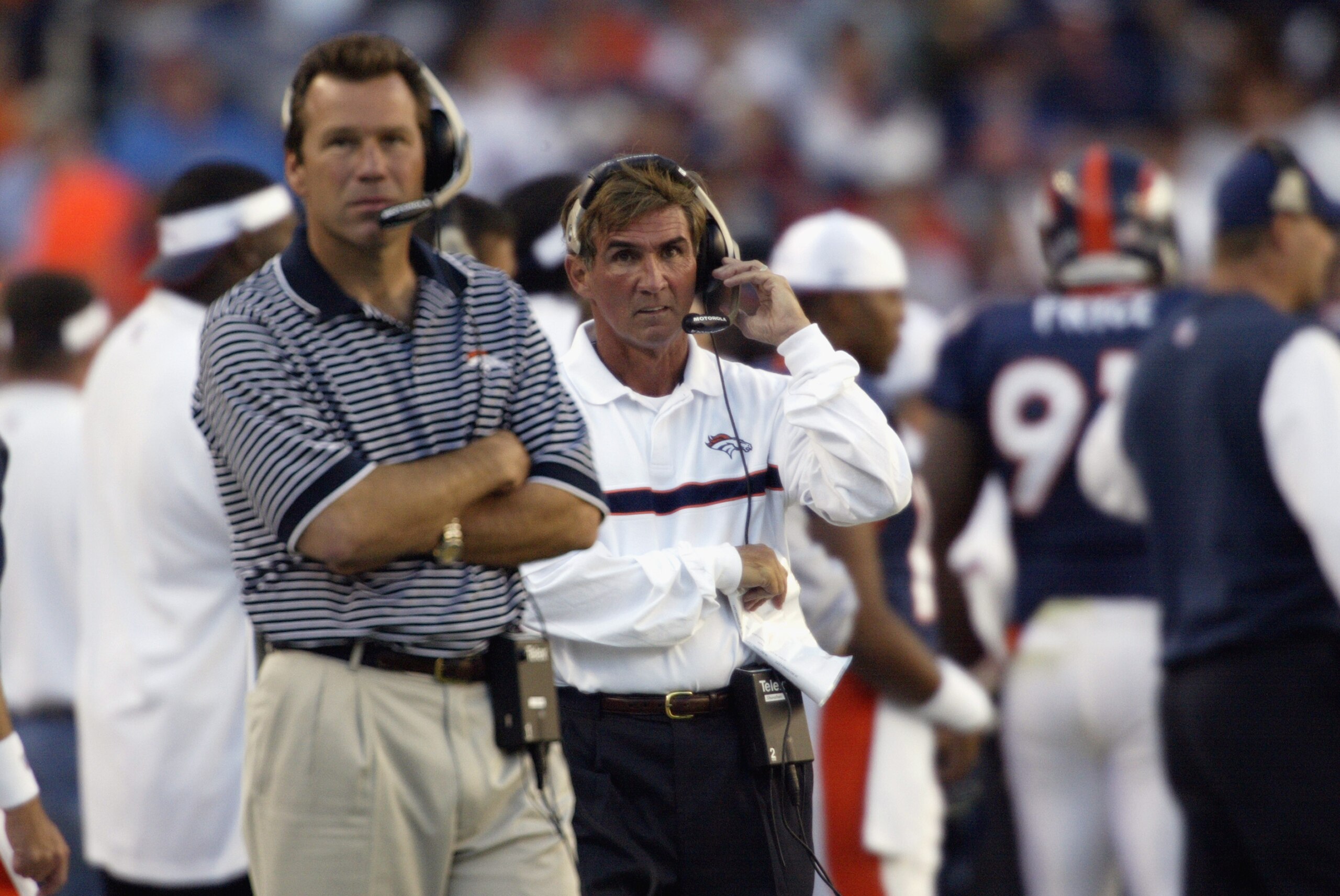 DENVER - SEPTEMBER 22: Head coach Mike Shanahan of the Denver Broncos stands next to offensive coordinator Gary Kubiak on the sideline during the NFL game against the Buffalo Bills on September 22, 2002, at Mile High Stadium in Denver, Colorado. The Bro DENVER - SEPTEMBER 22: Head coach Mike Shanahan of the Denver Broncos stands next to offensive coordinator Gary Kubiak on the sideline during the NFL game against the Buffalo Bills on September 22, 2002, at Mile High Stadium in Denver, Colorado. The Bro
