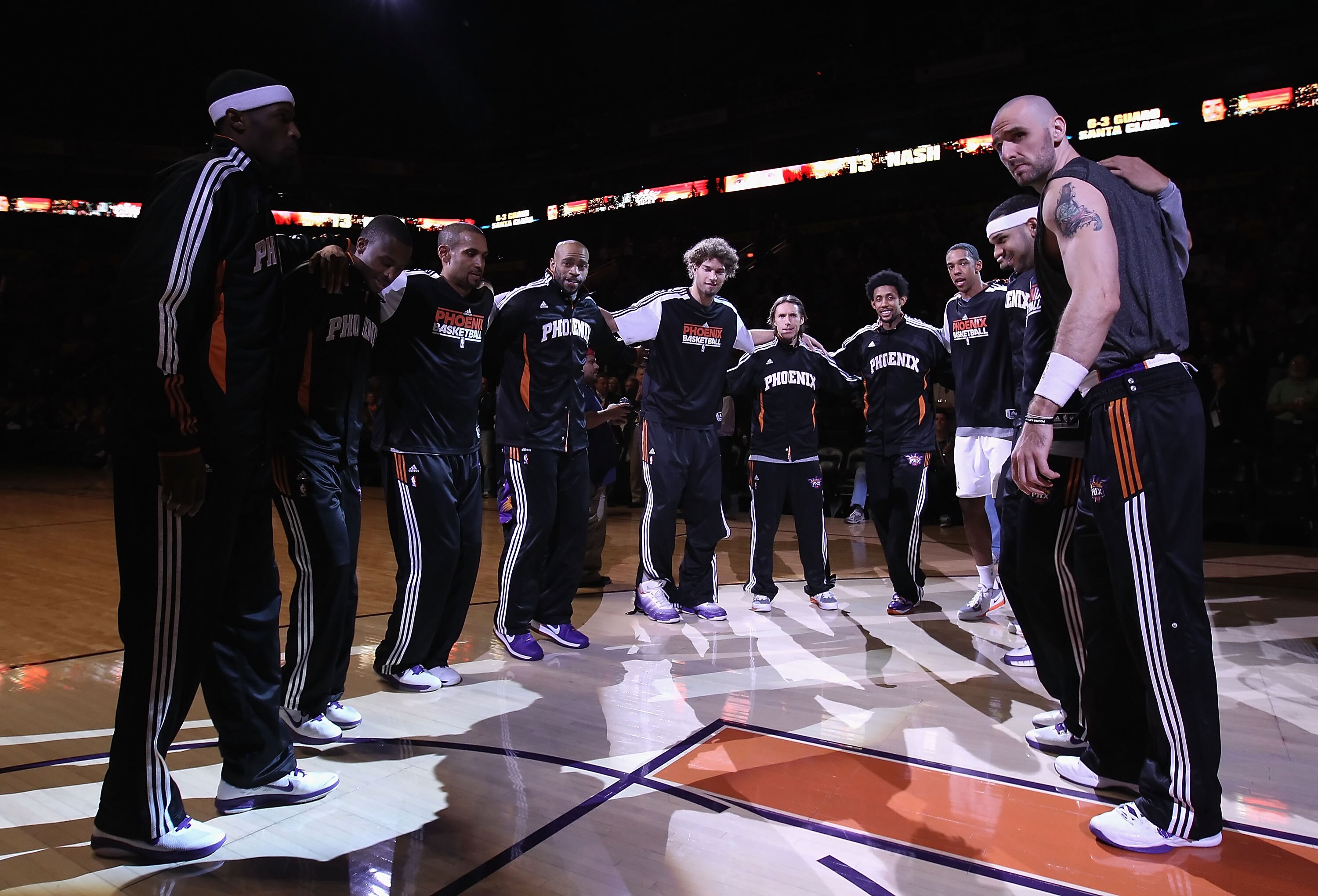PHOENIX, AZ - FEBRUARY 10:  The Phoenix Suns huddle up before the NBA game against the Golden State Warriors at US Airways Center on February 10, 2011 in Phoenix, Arizona. The Suns defeated the Warriors 112-88. NOTE TO USER: User expressly acknowledges an