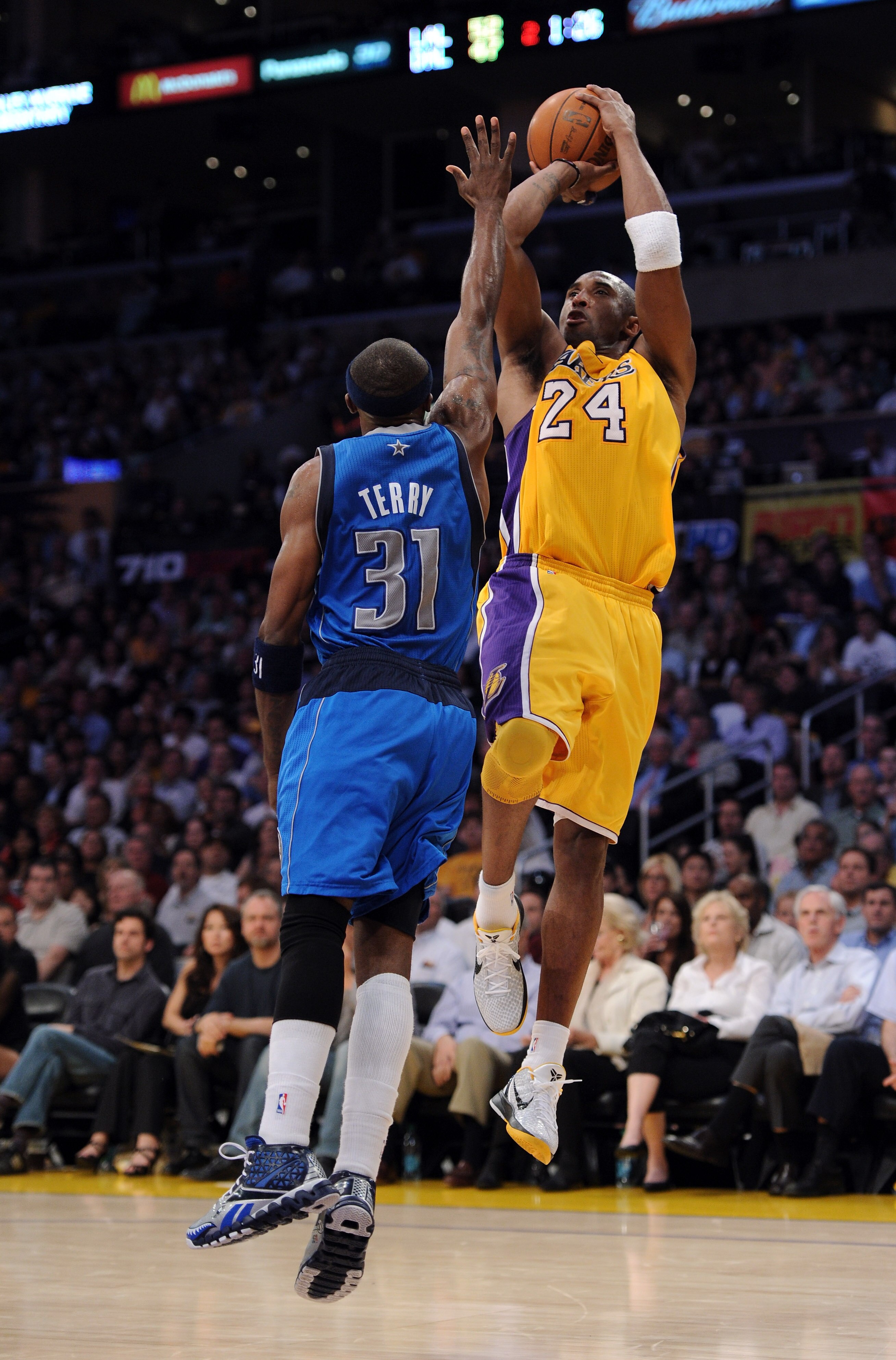 LOS ANGELES, CA - MARCH 31:  Kobe Bryant #24 of the Los Angeles Lakers shoots a jumper over Jason Terry #31 of the  Dallas Mavericks at Staples Center on March 31, 2011 in Los Angeles, California.  NOTE TO USER: User expressly acknowledges and agrees that