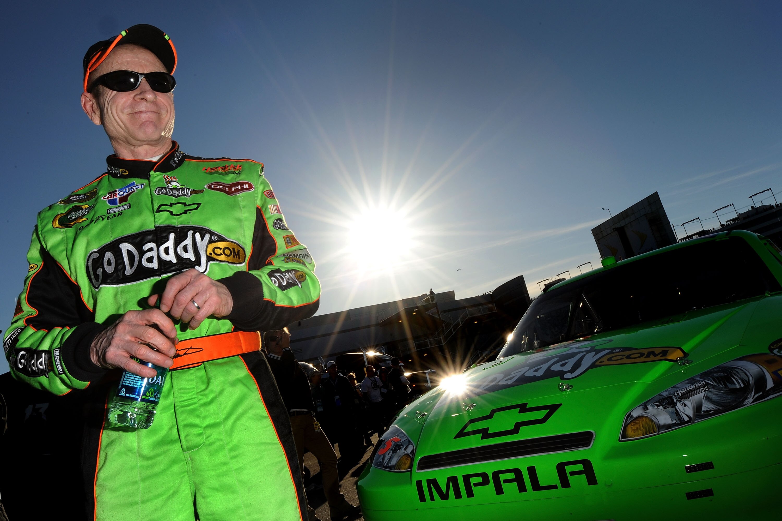 LAS VEGAS, NV - MARCH 04:  Mark Martin, driver of the #5 GoDaddy.com Chevrolet, stands in the garage area after qualifying for the NASCAR Sprint Cup Series Kobalt Tools 400 at Las Vegas Motor Speedway on March 4, 2011 in Las Vegas, Nevada.  (Photo by Jare