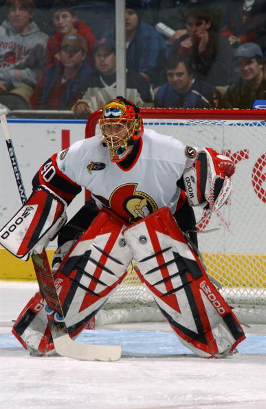 ATLANTA - NOVEMBER 25:  Patrick Lalime #40 of the Ottawa Senators eyes the play from the top of the crease against the Atlanta Thrashers at Philips Arena on November 25, 2003 in Atlanta, Georgia.  The Senators defeated the Thrashers 6-3.  (Photo by Scott
