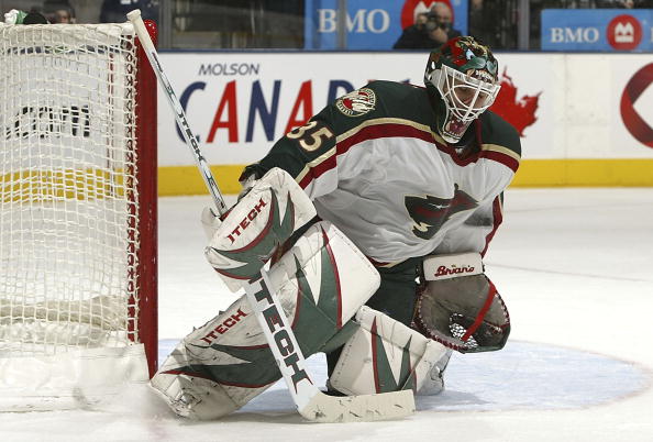 TORONTO - DECEMBER 26:  Manny Fernandez #35 of the Minnesota Wild makes a save on a shot from the Toronto Maple Leafs during their NHL game at the Air Canada Centre December 26, 2006 in Toronto, Ontario.  (Photo by Dave Sandford/Getty Images)