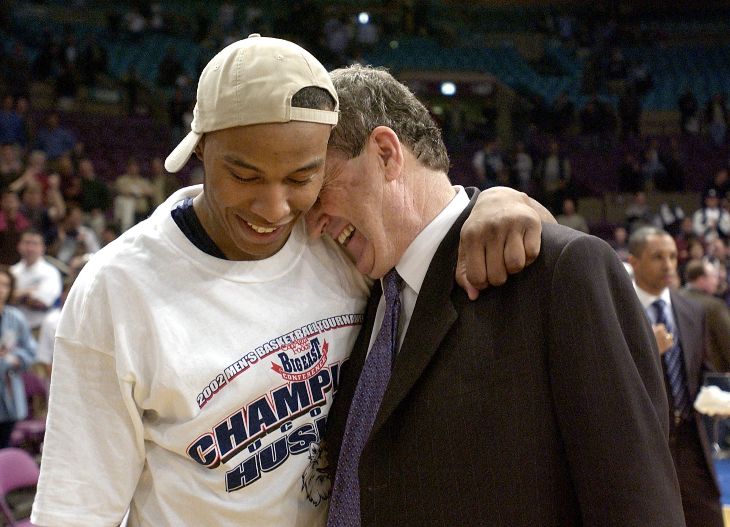 9 Mar 2002:  Caron Butler #3 of Connecticut, who was the tournament MVP, hugs head coach Jim Calhoun before he received his MVP award after the finals of the Big East Touranment at Madison Square Garden in New York City. UConn beat Pittsburgh 74-65. DIGIT