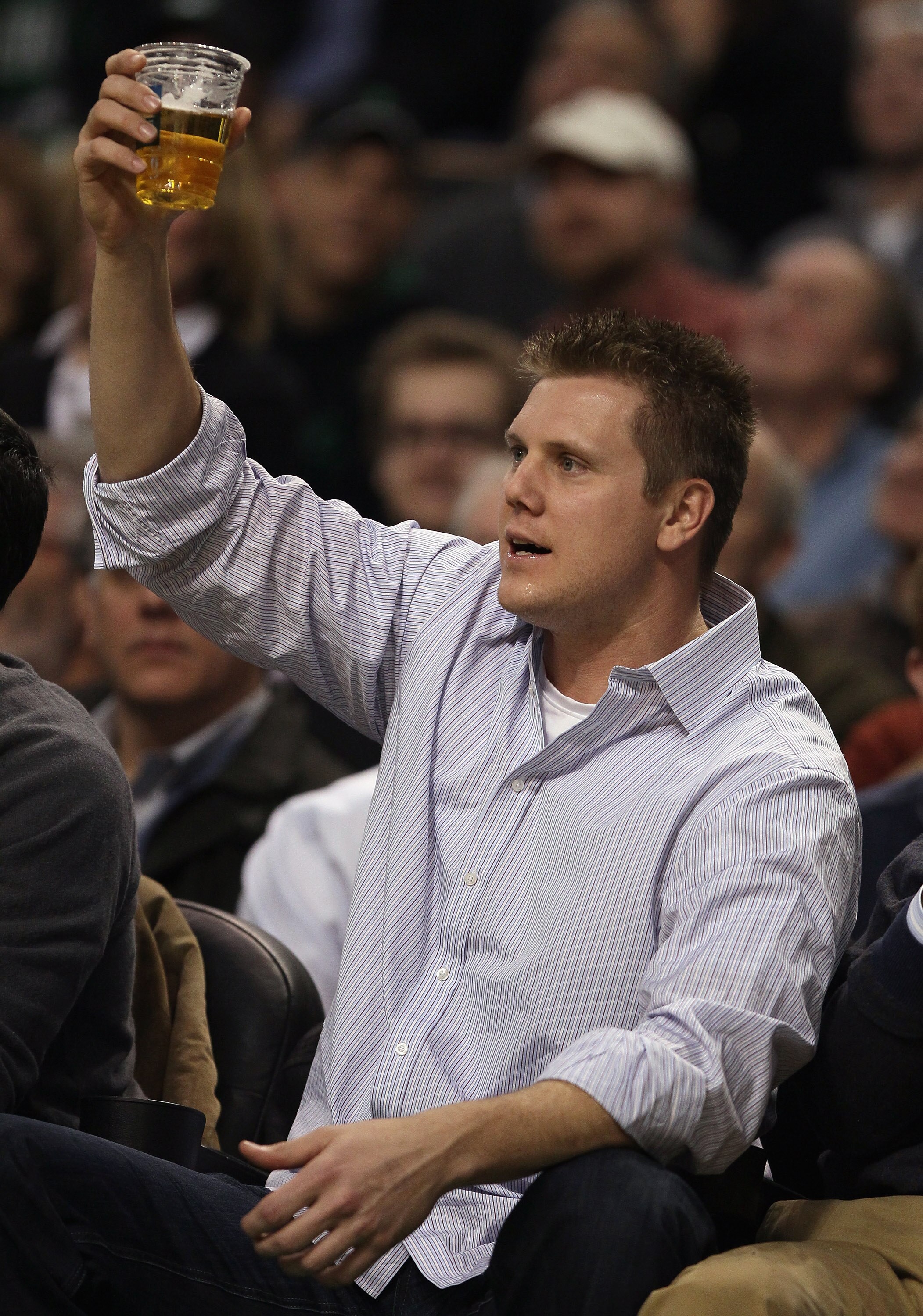 BOSTON, MA - JANUARY 17:  Boston Red Sox pitcher Jonathan Papelbon salutes the fans as he watches the Boston Celtics take on the Orlando Magic on January 17, 2011 at the TD Garden in Boston, Massachusetts.  NOTE TO USER: User expressly acknowledges and ag