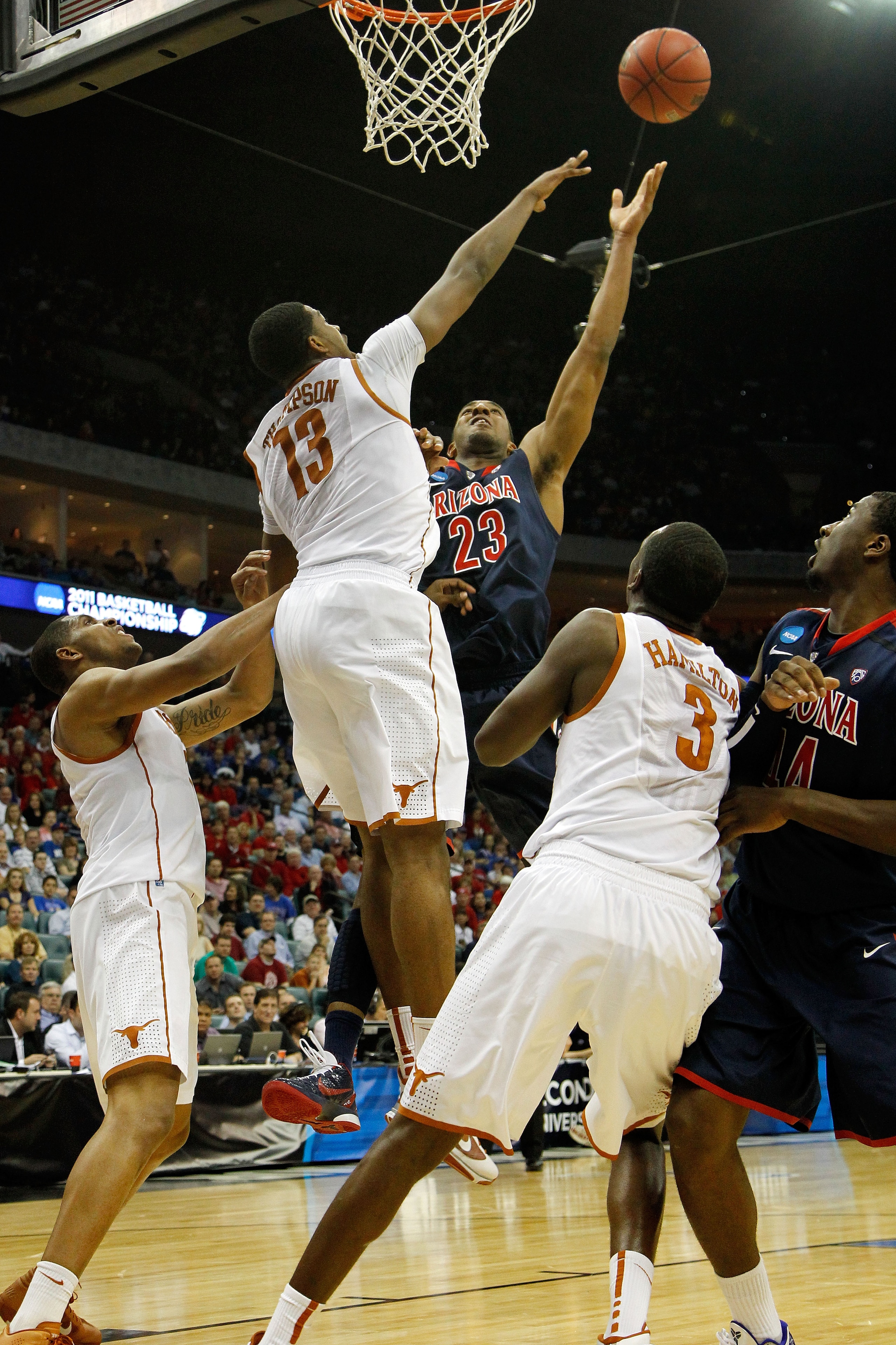 TULSA, OK - MARCH 20:  Derrick Williams #23 of the Arizona Wildcats goes up for a shot against Tristan Thompson #13 of the Texas Longhorns during the third round of the 2011 NCAA men's basketball tournament at BOK Center on March 20, 2011 in Tulsa, Oklaho
