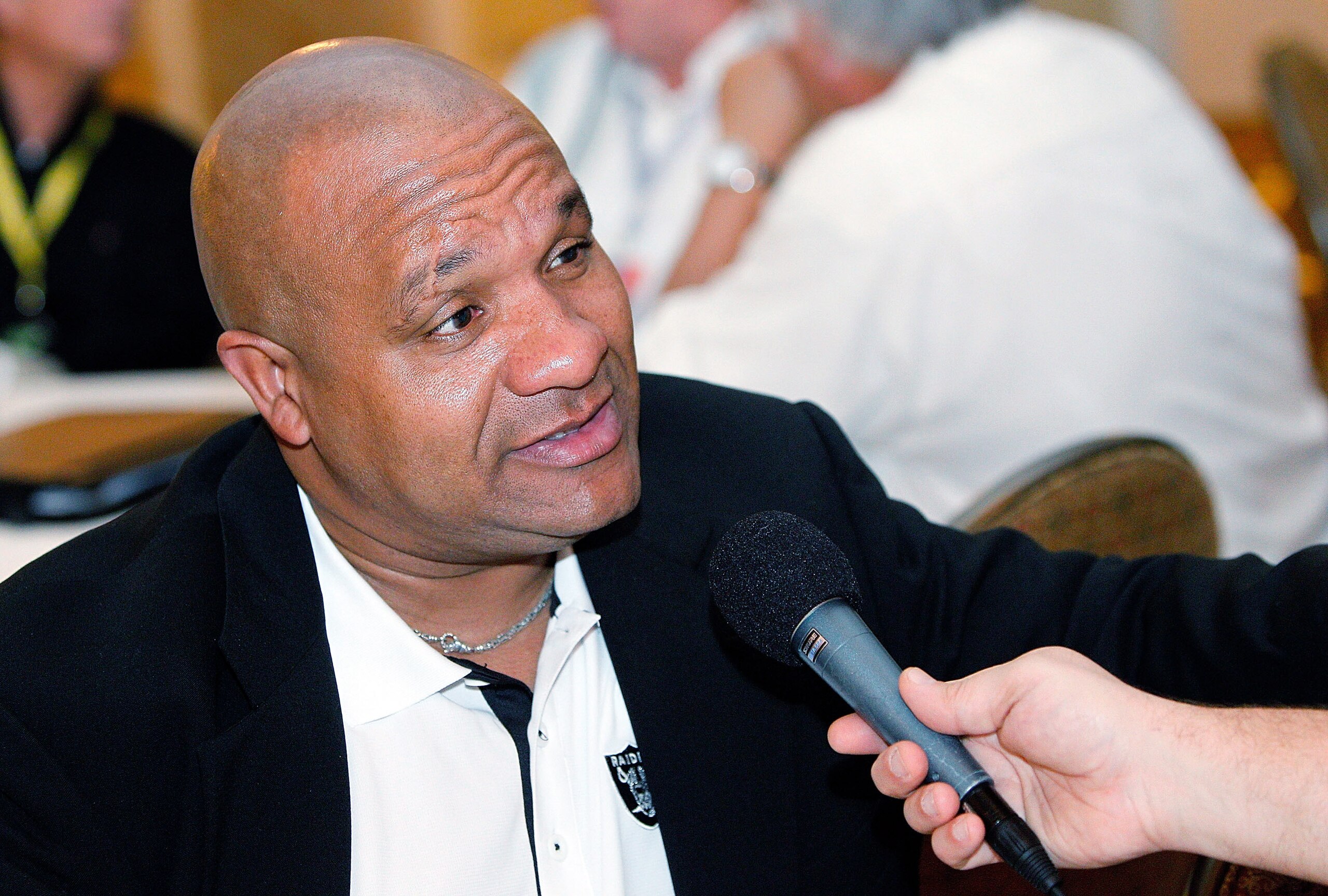 NEW ORLEANS, LA - MARCH 22:  Oakland Raiders head coach Hue Jackson answers questions from the media during the NFL Annual Meetings at the Roosevelt Hotel on March 22, 2011 in New Orleans, Louisiana. Despite a NFL owners imposed lockout in effect since Ma