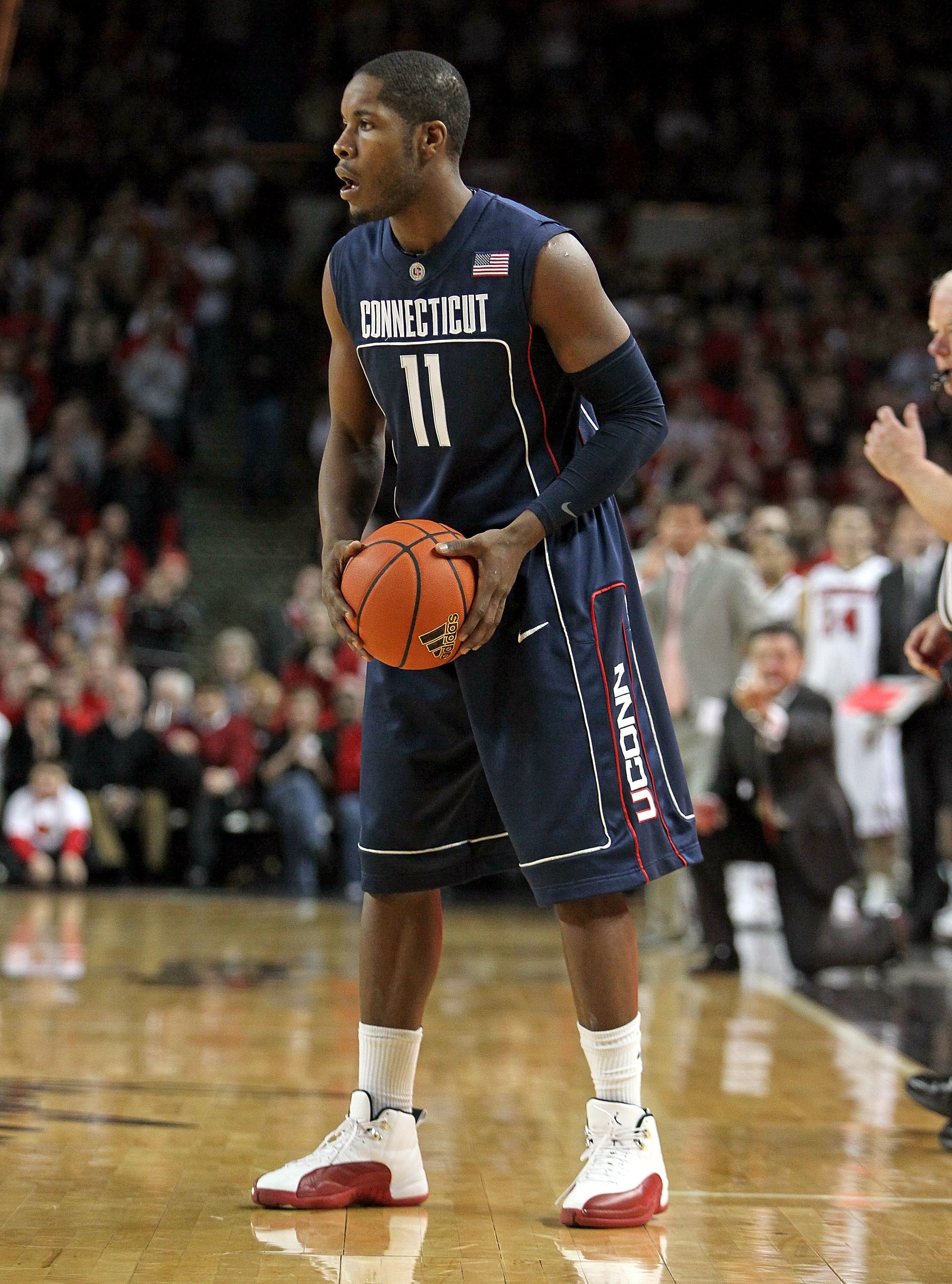 LOUISVILLE, KY - FEBRUARY 01:  Jerome Dyson #11 of the Connecticut Huskies holds the ball during the Big East Conference game against the Louisville Cardinals on February 1, 2010 at Freedom Hall in Louisville, Kentucky.  (Photo by Andy Lyons/Getty Images)