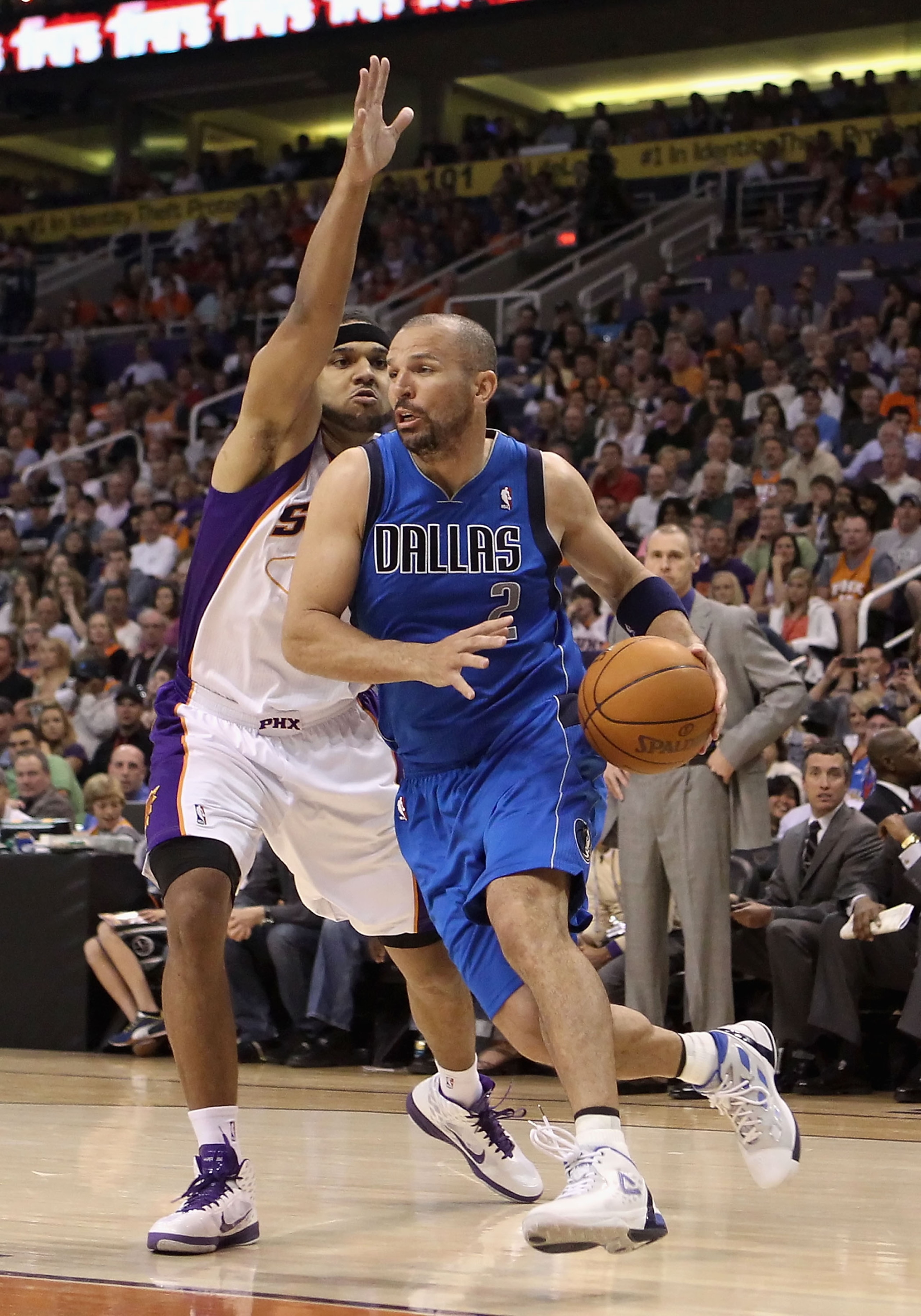 PHOENIX, AZ - MARCH 27: Jason Kidd #2 of the Dallas Mavericks drives the ball past Jared Dudley #3 of the Phoenix Suns during the NBA game at US Airways Center on March 27, 2011 in Phoenix, Arizona. NOTE TO USER: User expressly acknowledges and agrees t PHOENIX, AZ - MARCH 27: Jason Kidd #2 of the Dallas Mavericks drives the ball past Jared Dudley #3 of the Phoenix Suns during the NBA game at US Airways Center on March 27, 2011 in Phoenix, Arizona. NOTE TO USER: User expressly acknowledges and agrees t