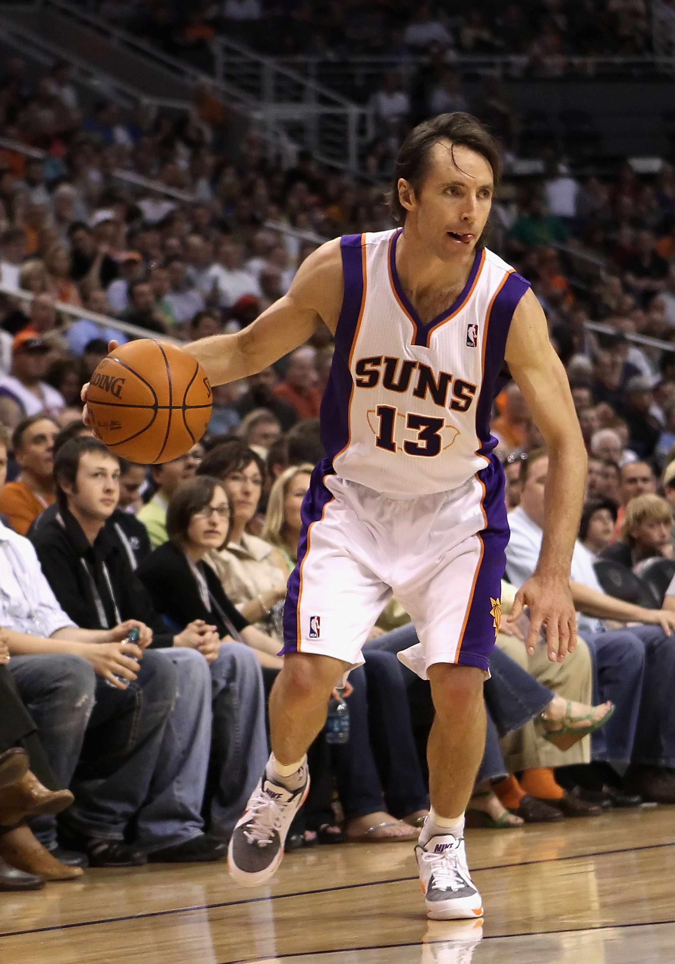 PHOENIX, AZ - MARCH 30: Steve Nash #13 of the Phoenix Suns handles the ball during the NBA game against the Oklahoma City Thunder at US Airways Center on March 30, 2011 in Phoenix, Arizona. The Thunder defeated the Suns 116-98. NOTE TO USER: User expres PHOENIX, AZ - MARCH 30: Steve Nash #13 of the Phoenix Suns handles the ball during the NBA game against the Oklahoma City Thunder at US Airways Center on March 30, 2011 in Phoenix, Arizona. The Thunder defeated the Suns 116-98. NOTE TO USER: User expres