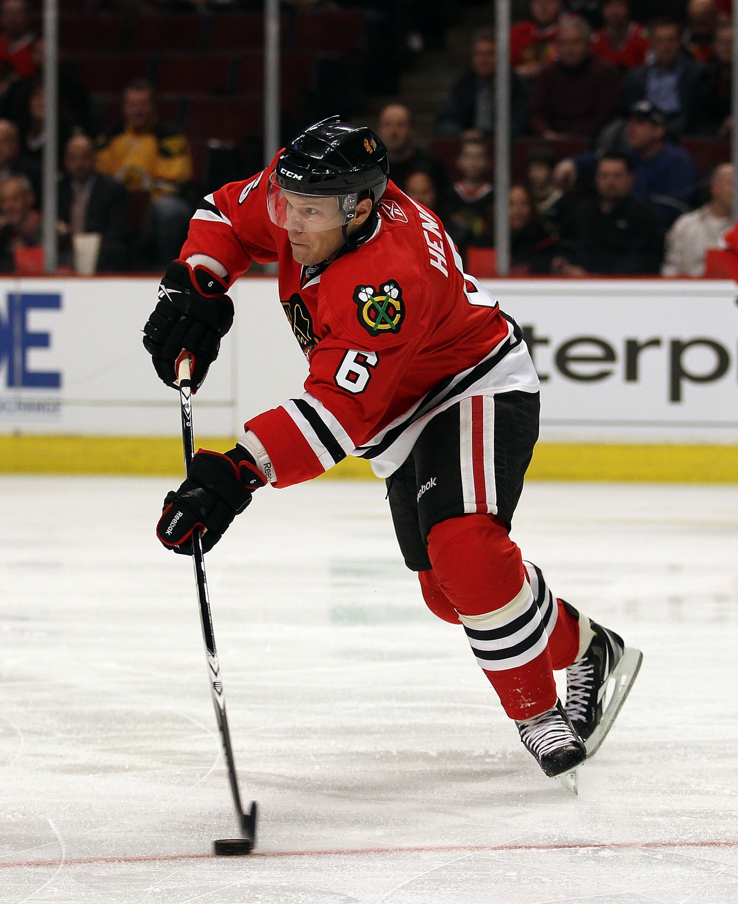 CHICAGO, IL - FEBRUARY 16: Jordan Hendry #6 of the Chicago Blackhawks looks to pass against the Minnesota Wild at the United Center on February 16, 2011 in Chicago, Illinois. The Blackhawks defeated the Wild 3-1. (Photo by Jonathan Daniel/Getty Images)