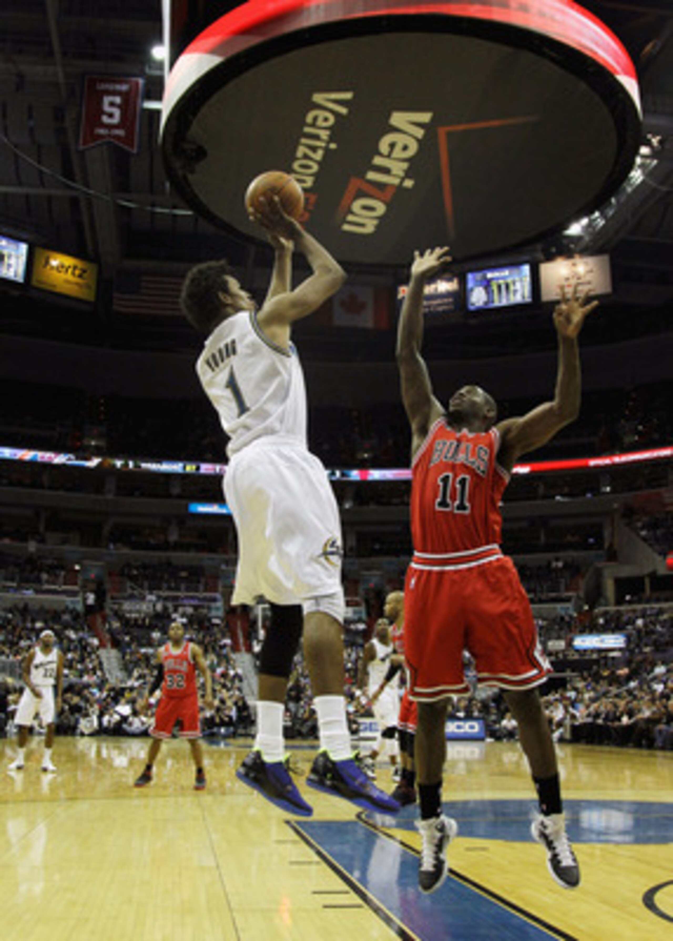 WASHINGTON, DC - FEBRUARY 28: Nick Young #1 of the Washington Wizards shoots over Ronnie Brewer #11 of the Chicago Bulls at the Verizon Center in Washington on February 28, 2011 in Washington, DC. NOTE TO USER: User expressly acknowledges and agrees that,