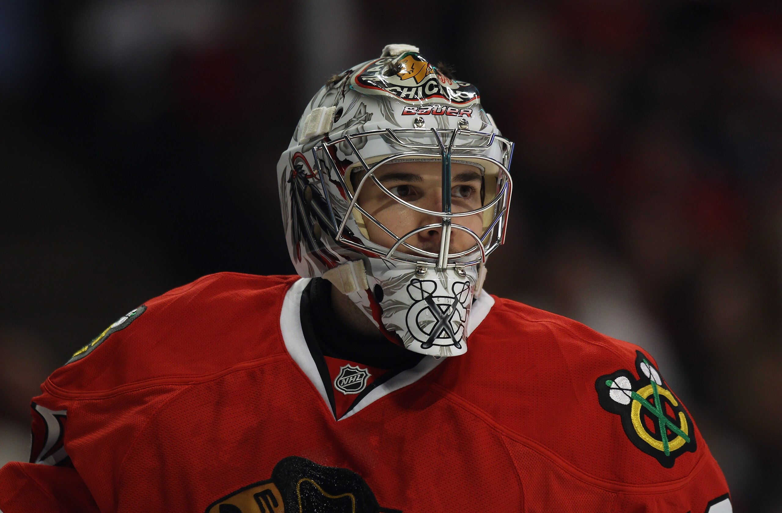 CHICAGO, IL - APRIL 10: Corey Crawford #50 of the Chicago Blackhawks rests during a break in the action against the Detroit Red Wings at the United Center on April 10, 2011 in Chicago, Illinois. The Red Wings defeated the Blackhawks 4-3. (Photo by Jonatha