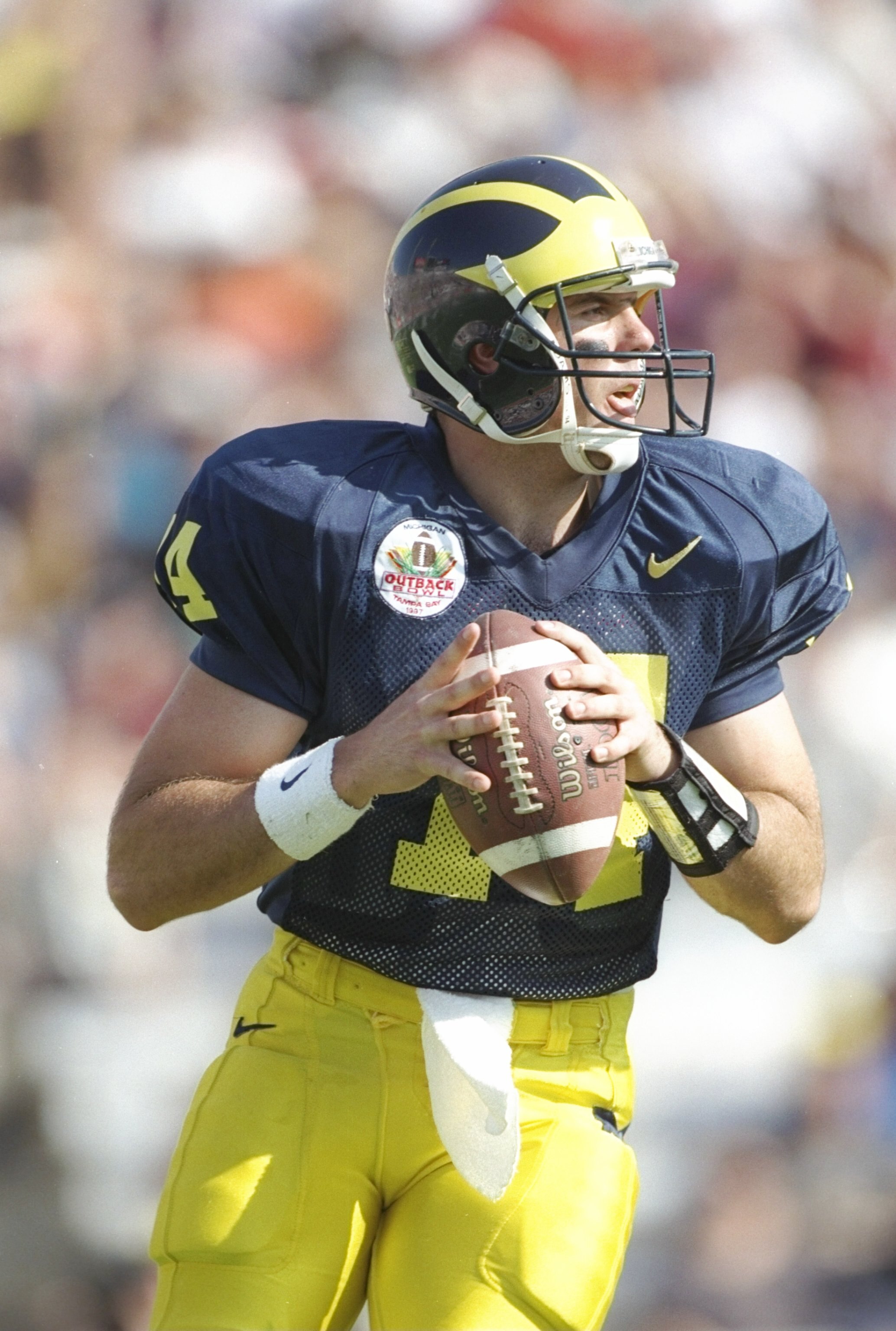 1 Jan 1997:  Quarterback Brian Griese of the Michigan Wolverines prepares to pass the ball during the Outback Bowl game against the Alabama Crimson Tide at Tampa Stadium in Tampa, Florida.  Alabama won the game 17-14. Mandatory Credit: Jamie Squire  /Alls