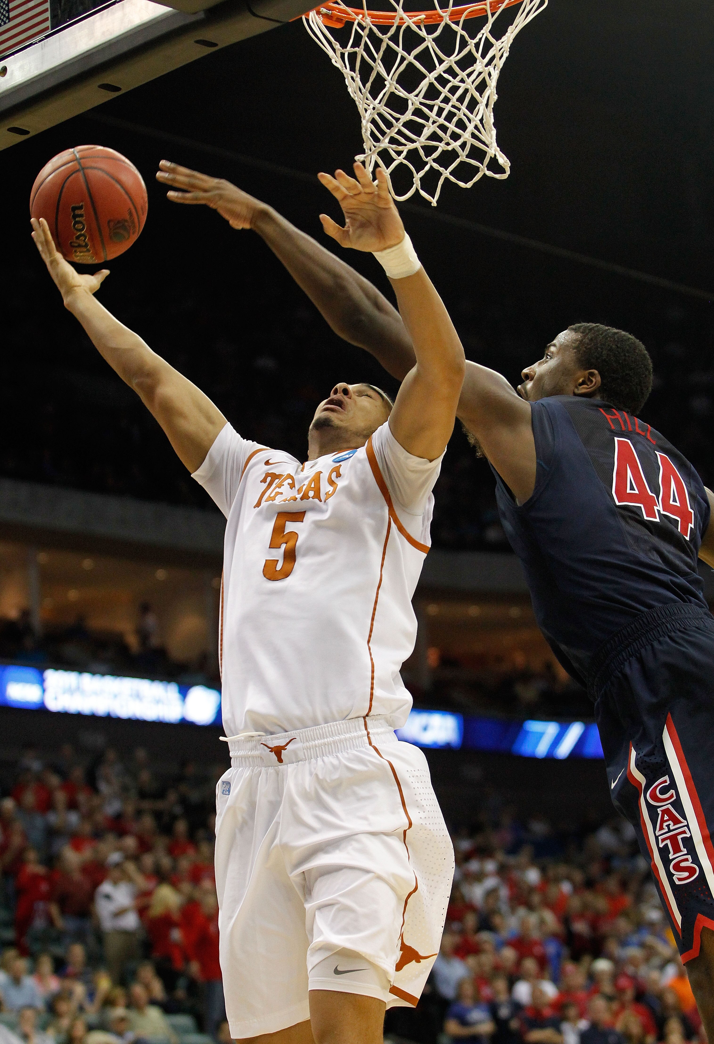 TULSA, OK - MARCH 20:  Cory Joseph #5 of the Texas Longhorns goes up for a shot against Solomon Hill #44 of the Arizona Wildcats during the third round of the 2011 NCAA men's basketball tournament at BOK Center on March 20, 2011 in Tulsa, Oklahoma.  (Phot