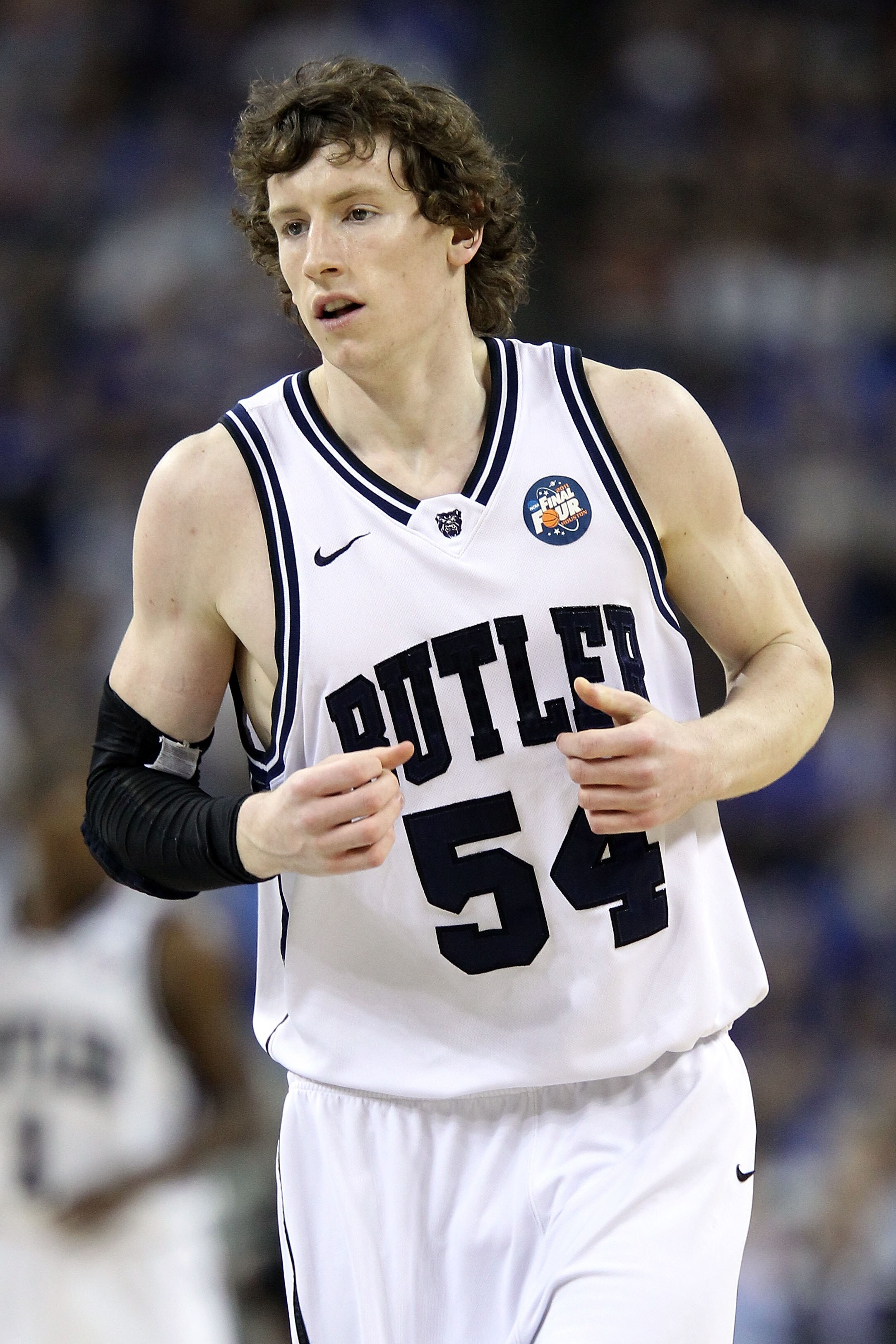 HOUSTON, TX - APRIL 02:  Matt Howard #54 of the Butler Bulldogs runs back down court while taking on the Virginia Commonwealth Rams during the National Semifinal game of the 2011 NCAA Division I Men's Basketball Championship at Reliant Stadium on April 2,