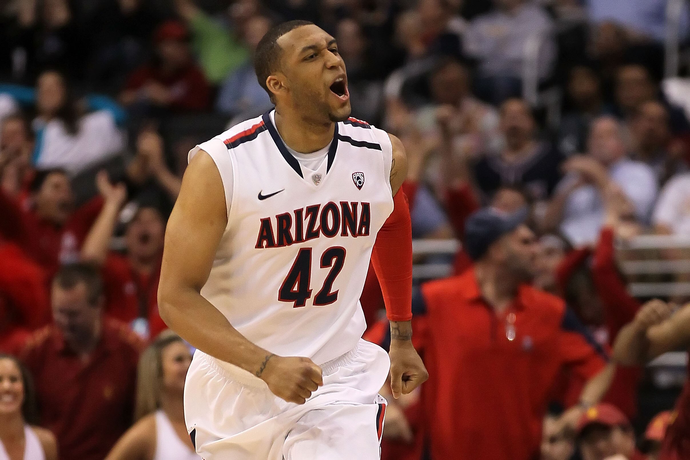 LOS ANGELES, CA - MARCH 11:  Jamelle Horne #42 of the Arizona Wildcats reacts after making a three-pointer late in the second half while taking on the USC Trojans in the semifinals of the 2011 Pacific Life Pac-10 Men's Basketball Tournament at Staples Cen