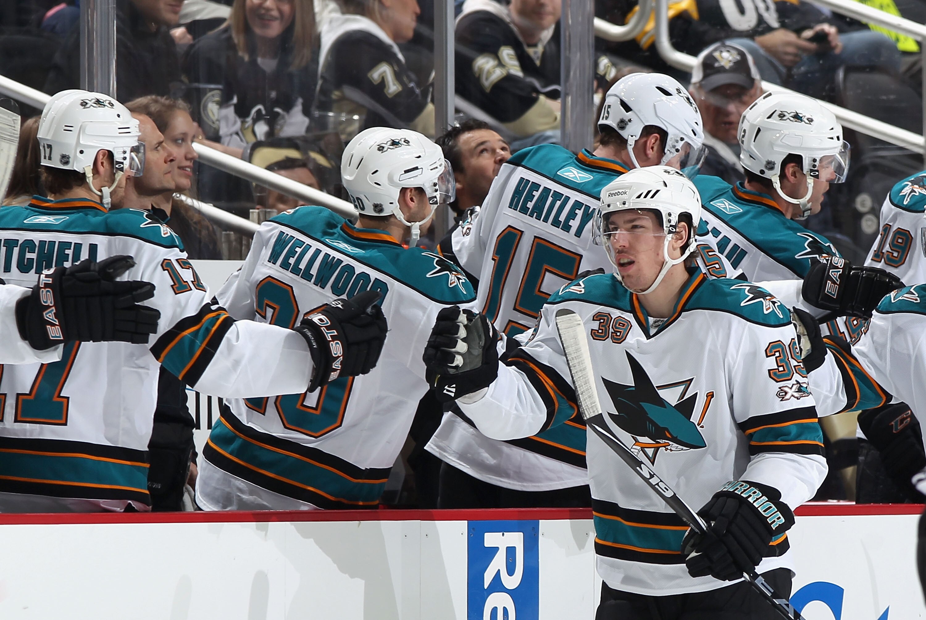 PITTSBURGH, PA - FEBRUARY 23:  Logan Couture #39 of the San Jose Sharks celebrates with teammates after scoring during the NHL game against the Pittsburgh Penguins at Consol Energy Center on February 23, 2011 in Pittsburgh, Pennsylvania. The Sharks defeat
