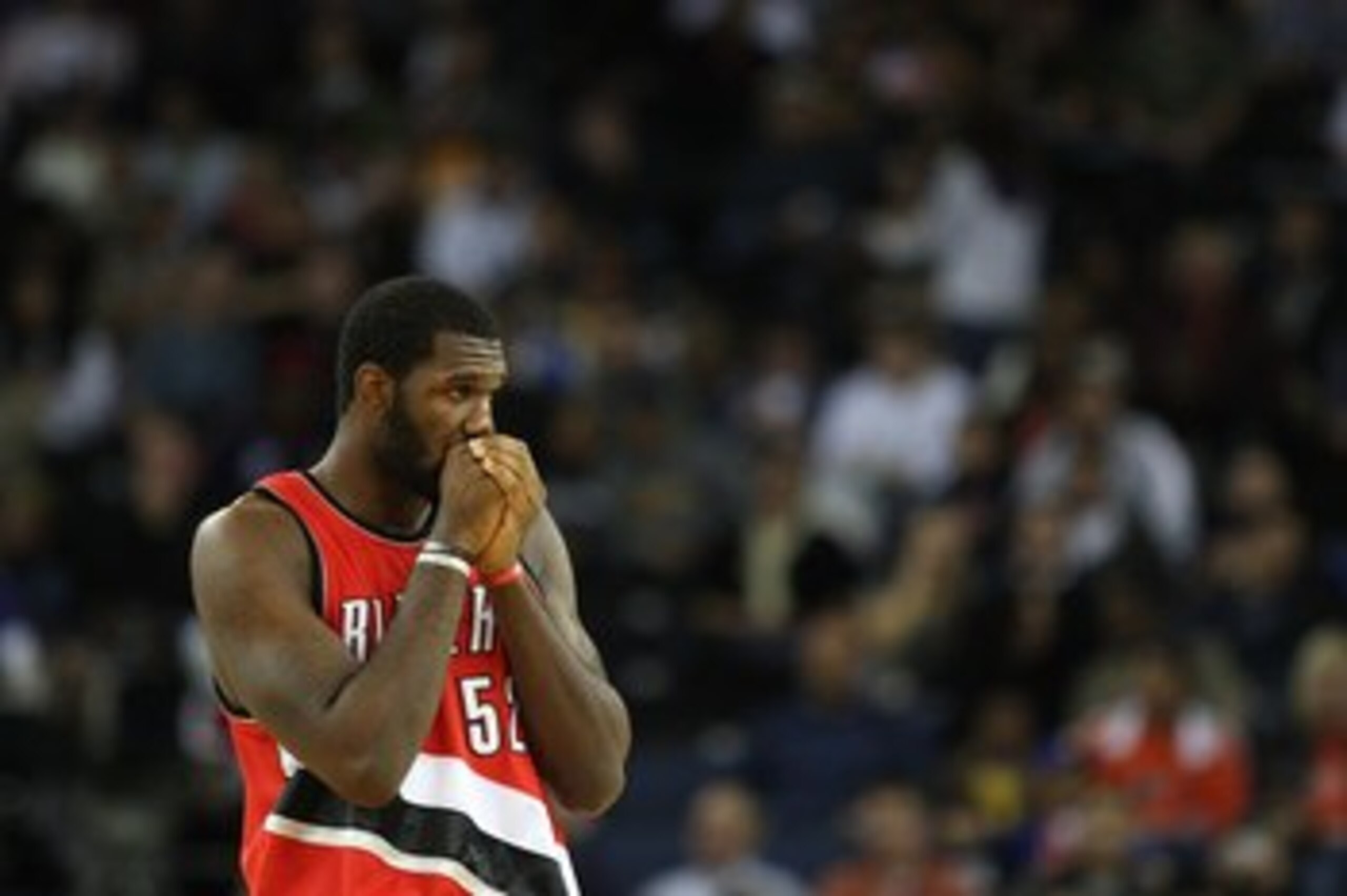 OAKLAND, CA - NOVEMBER 20:  Greg Oden #52 of the Portland Trail Blazers looks on against the Golden State Warriors during an NBA game at Oracle Arena on November 20, 2009 in Oakland, California.  (Photo by Jed Jacobsohn/Getty Images)