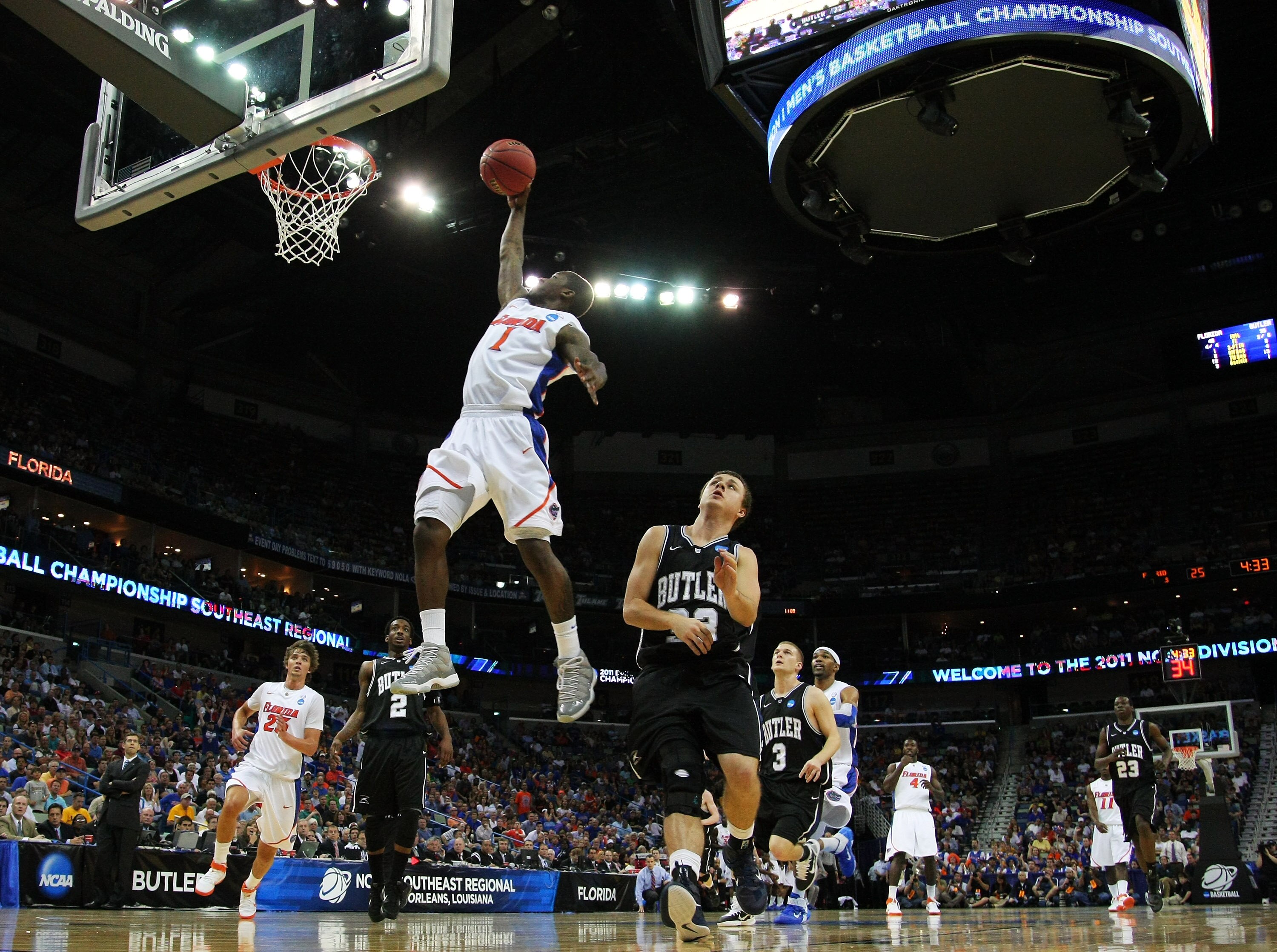 NEW ORLEANS, LA - MARCH 26:  Kenny Boynton #1 of the Florida Gators dunks on the Butler Bulldogs during the Southeast regional final of the 2011 NCAA men's basketball tournament at New Orleans Arena on March 26, 2011 in New Orleans, Louisiana.  (Photo by