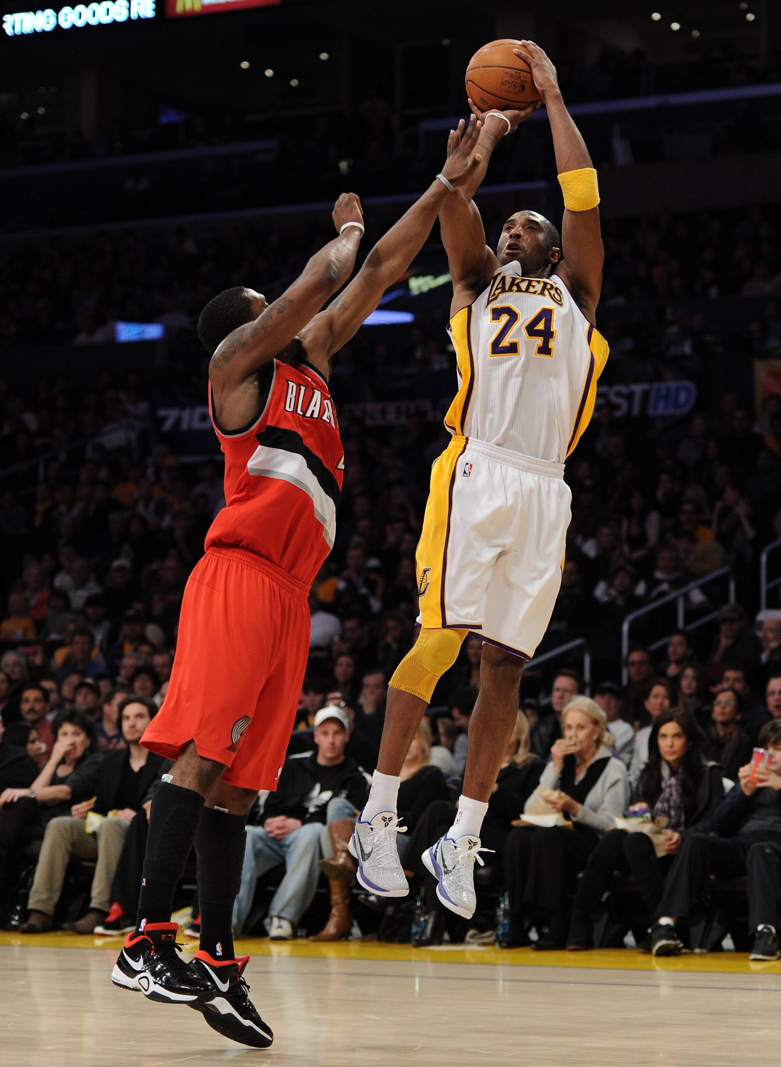 LOS ANGELES, CA - MARCH 20:  Kobe Bryant #24 of the Los Angeles Lakers shoots a jumper over Wesley Matthews #2 of the Portland Trail Blazers at the Staples Center on March 20, 2011 in Los Angeles, California.  NOTE TO USER: User expressly acknowledges and