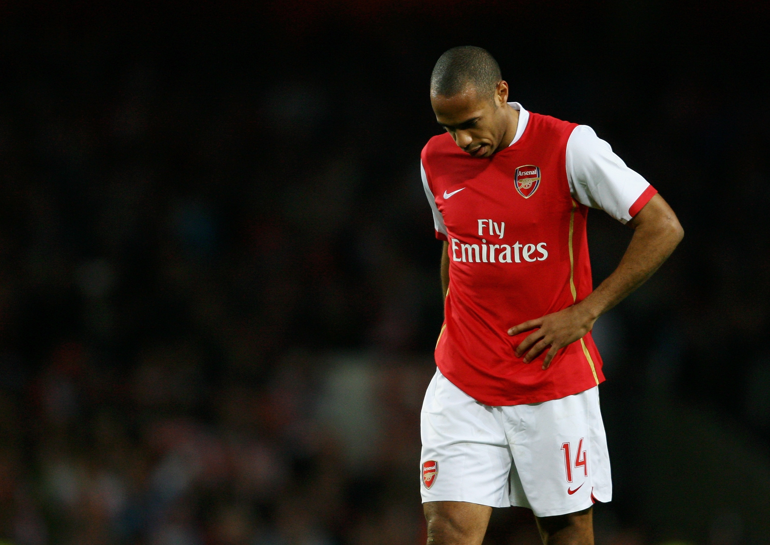 LONDON - MARCH 07:  A dejected Thierry Henry of Arsenal looks on as the final whistle blows during the UEFA Champions League round of sixteen, second leg match between Arsenal and PSV Eindhoven at The Emirates Stadium on March 7, 2007 in London, England.