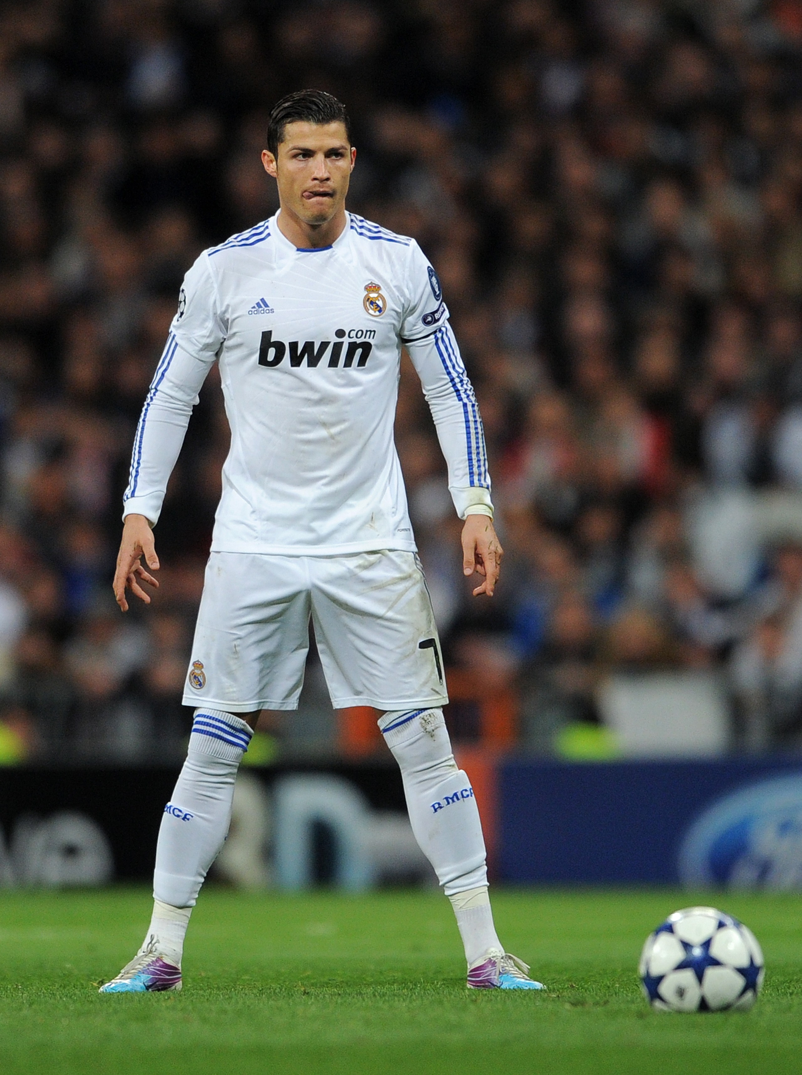 MADRID, SPAIN - MARCH 16: Cristiano Ronaldo of Real Madrid lines up a free kick during the UEFA Champions League round of 16 second leg match between Real Madrid and Lyon at Estadio Santiago Bernabeu on March 16, 2011 in Madrid, Spain. (Photo by Jasper MADRID, SPAIN - MARCH 16: Cristiano Ronaldo of Real Madrid lines up a free kick during the UEFA Champions League round of 16 second leg match between Real Madrid and Lyon at Estadio Santiago Bernabeu on March 16, 2011 in Madrid, Spain. (Photo by Jasper