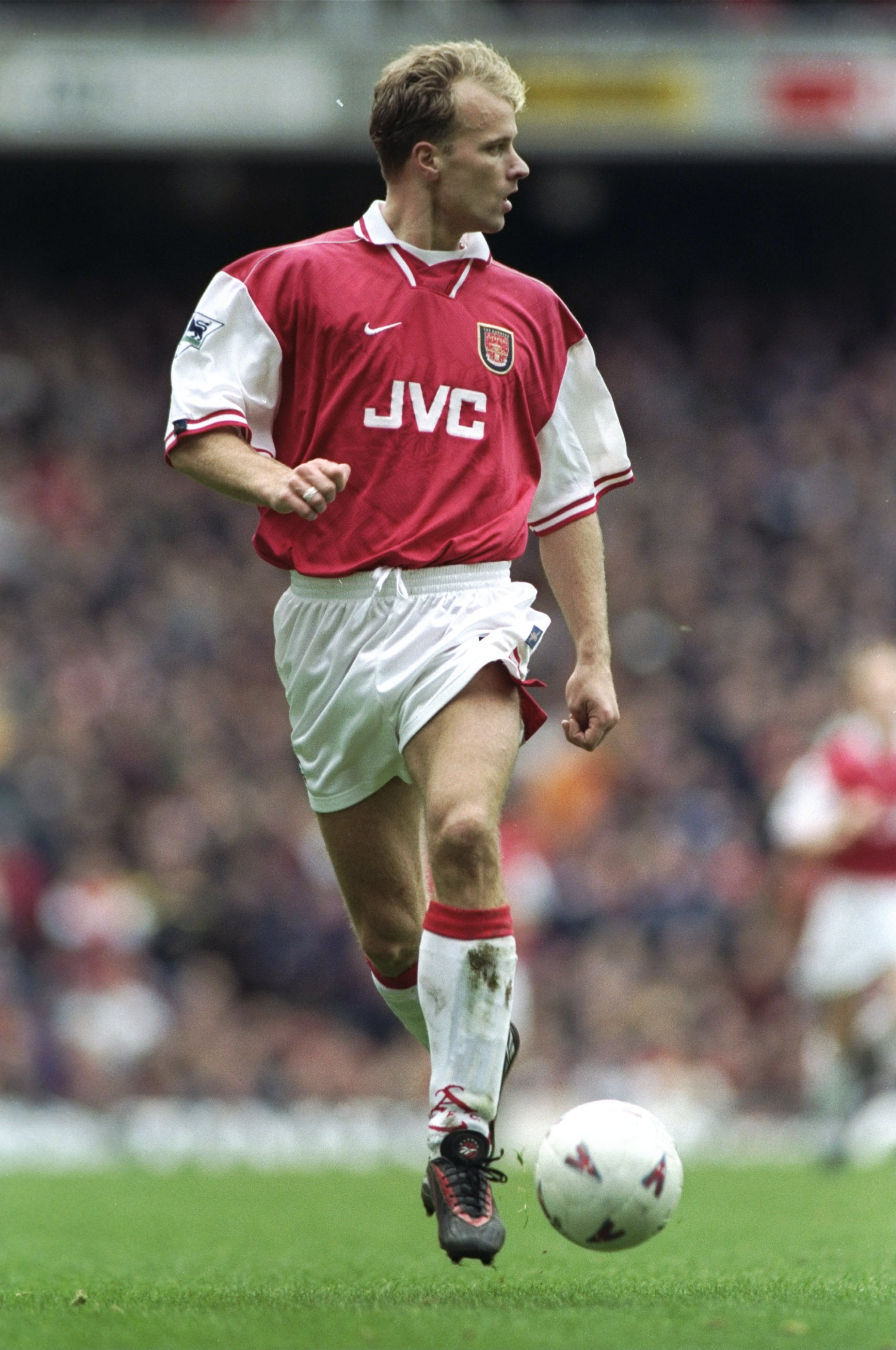 26 Dec 1997:  Dennis Bergkamp of Arsenal looks up during the FA Carling Premiership match against Leicester City at Highbury Stadium in London. Arsenal won 2-1. \ Mandatory Credit: Shaun Botterill /Allsport