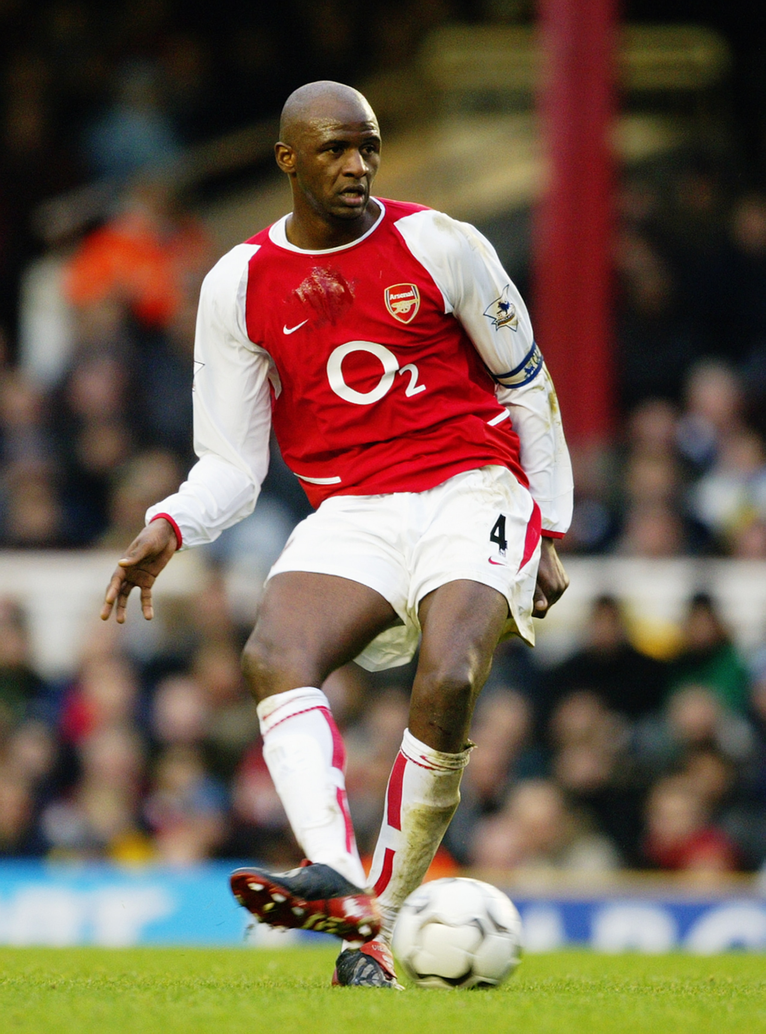 LONDON - DECEMBER 26: Patrick Vieira of Arsenal passes the ball during the FA Barclaycard Premiership match between Arsenal and Wolverhampton Wanderers at Highbury on December 26, 2003 in London, England. Arsenal won the match 3-0. (Photo by Clive Mason LONDON - DECEMBER 26: Patrick Vieira of Arsenal passes the ball during the FA Barclaycard Premiership match between Arsenal and Wolverhampton Wanderers at Highbury on December 26, 2003 in London, England. Arsenal won the match 3-0. (Photo by Clive Mason