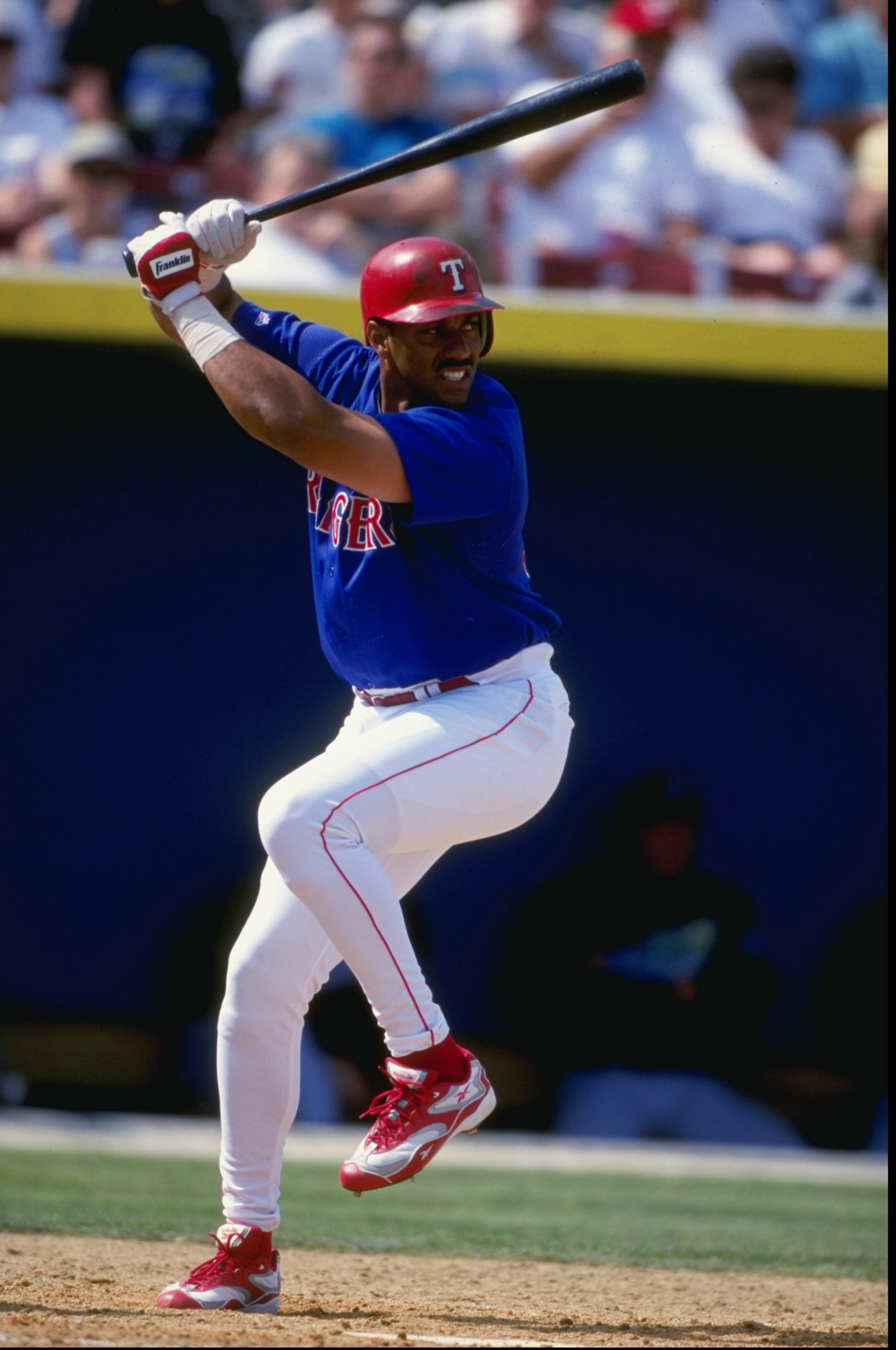 8 Mar 1999:  Outfielder Juan Gonzalez #19 of the Texas Rangers at bat during the Spring Training game against the Tampa Bay Devil Rays at the Charlotte County Stadium in Port Charlotte, Florida. The Rangers defeated the Devil Rays 6-4. Mandatory Credit: J