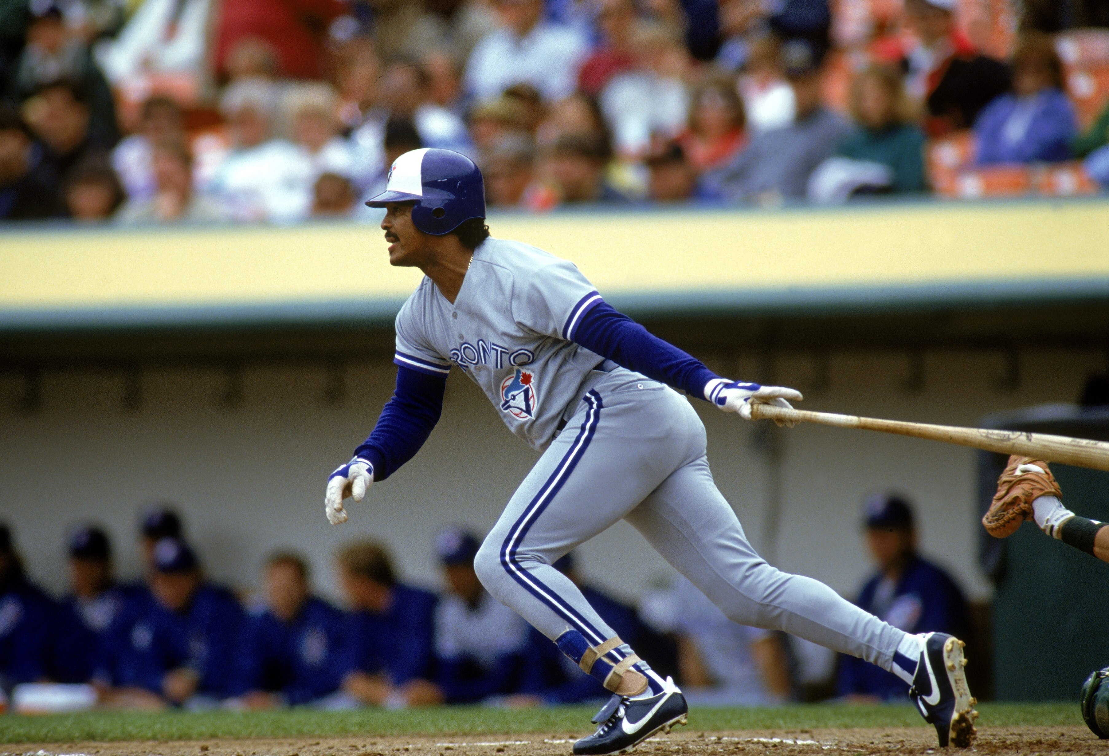 OAKLAND, CA - 1990:  George Bell #11 of the Toronto Blue Jays swings at a pitch during a 1990 game against the Oakland Athletics at the Oakland-Alameda Coliseum in Oakland, California.  (Photo by Otto Greule Jr/Getty Images)