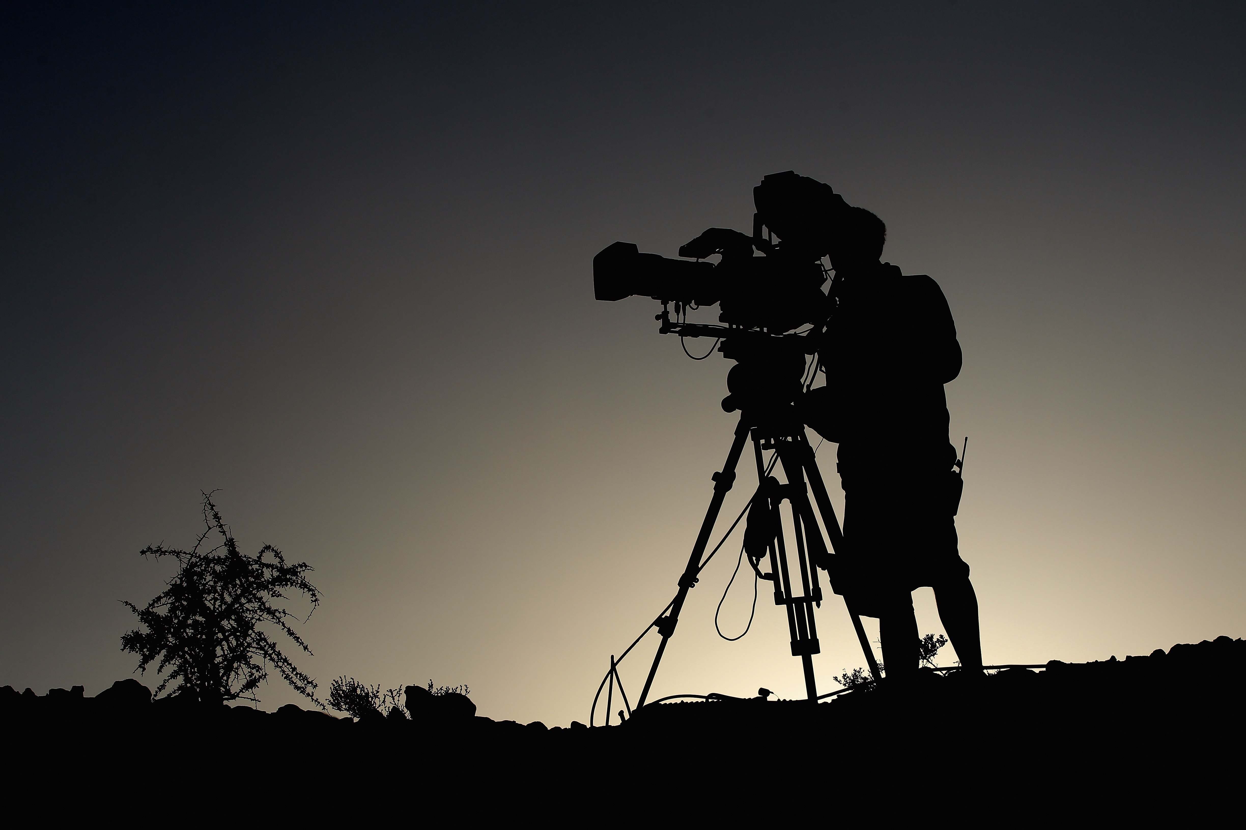 DOHA, QATAR - FEBRUARY 03: A TV cameraman pictured during the first round of the Commercialbank Qatar Masters at the Doha Golf Club on February 3, 2011 in Doha, Qatar.  (Photo by Ross Kinnaird/Getty Images)