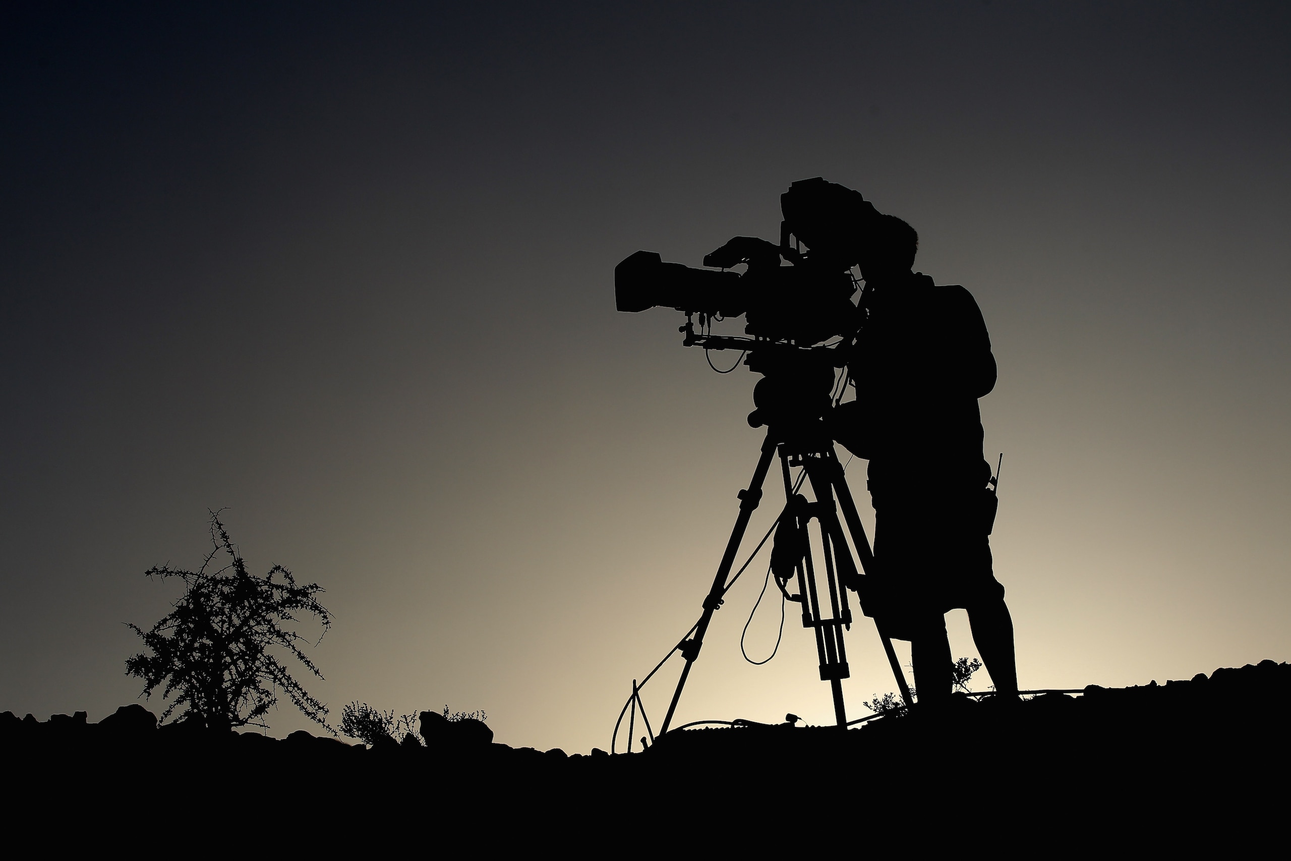 DOHA, QATAR - FEBRUARY 03: A TV cameraman pictured during the first round of the Commercialbank Qatar Masters at the Doha Golf Club on February 3, 2011 in Doha, Qatar.  (Photo by Ross Kinnaird/Getty Images)