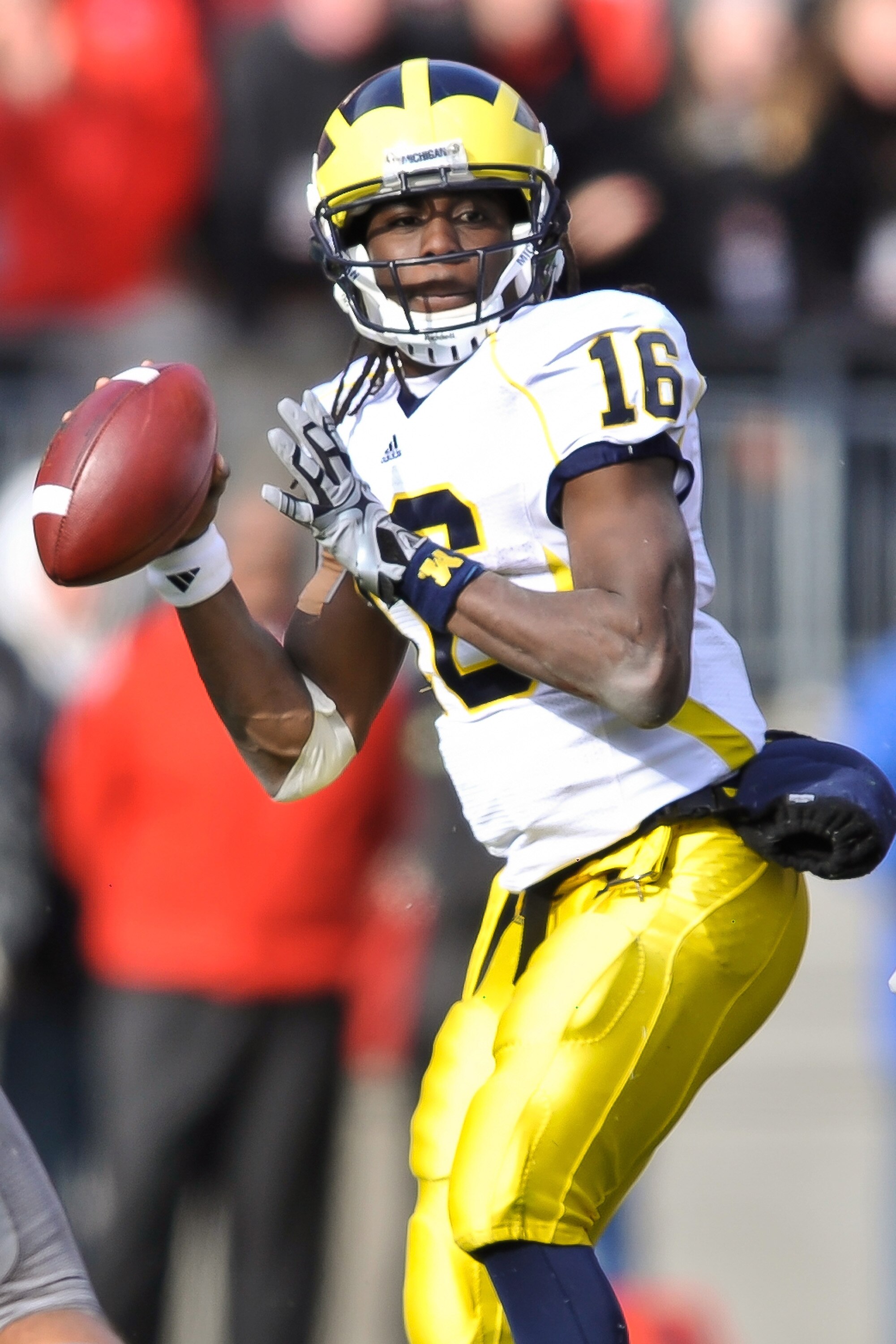 COLUMBUS, OH - NOVEMBER 27:  Quarterback Denard Robinson #16 of the Michigan Wolverines drops back to pass against the Ohio State Buckeyes at Ohio Stadium on November 27, 2010 in Columbus, Ohio.  (Photo by Jamie Sabau/Getty Images)