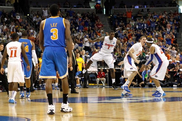TAMPA, FL - MARCH 19:  Kenny Boynton #1, Erik Murphy #33 and Alex Tyus #23 of the Florida Gators react as Malcolm Lee #3 of the UCLA Bruins walks back to the bench during a timeout late in the second half during the third round of the 2011 NCAA men's bask