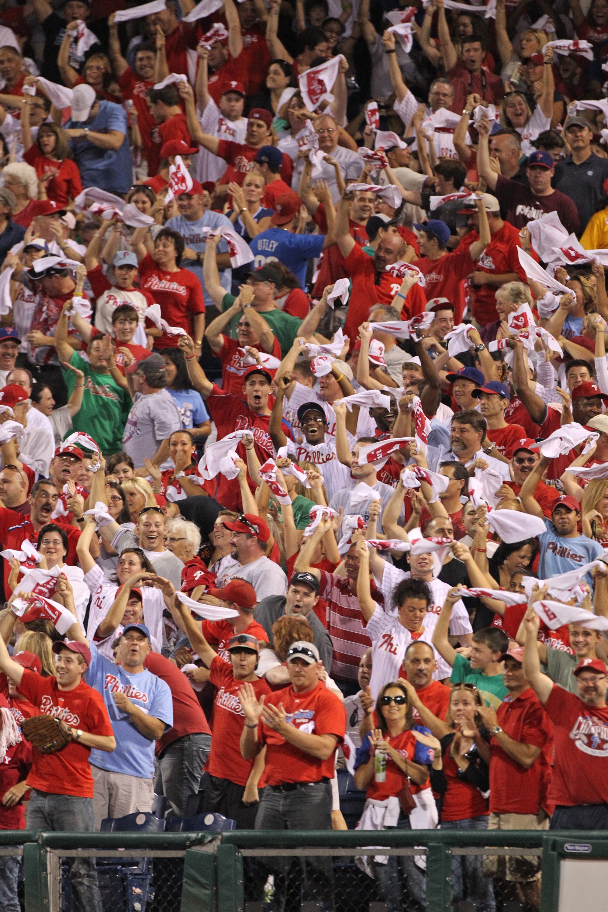 PHILADELPHIA - SEPTEMBER 25: Philadelphia Phillies fans cheer a two-run home run in the first inning of a game against the New York Mets at Citizens Bank Park on September 25, 2010 in Philadelphia, Pennsylvania. (Photo by Hunter Martin/Getty Images)