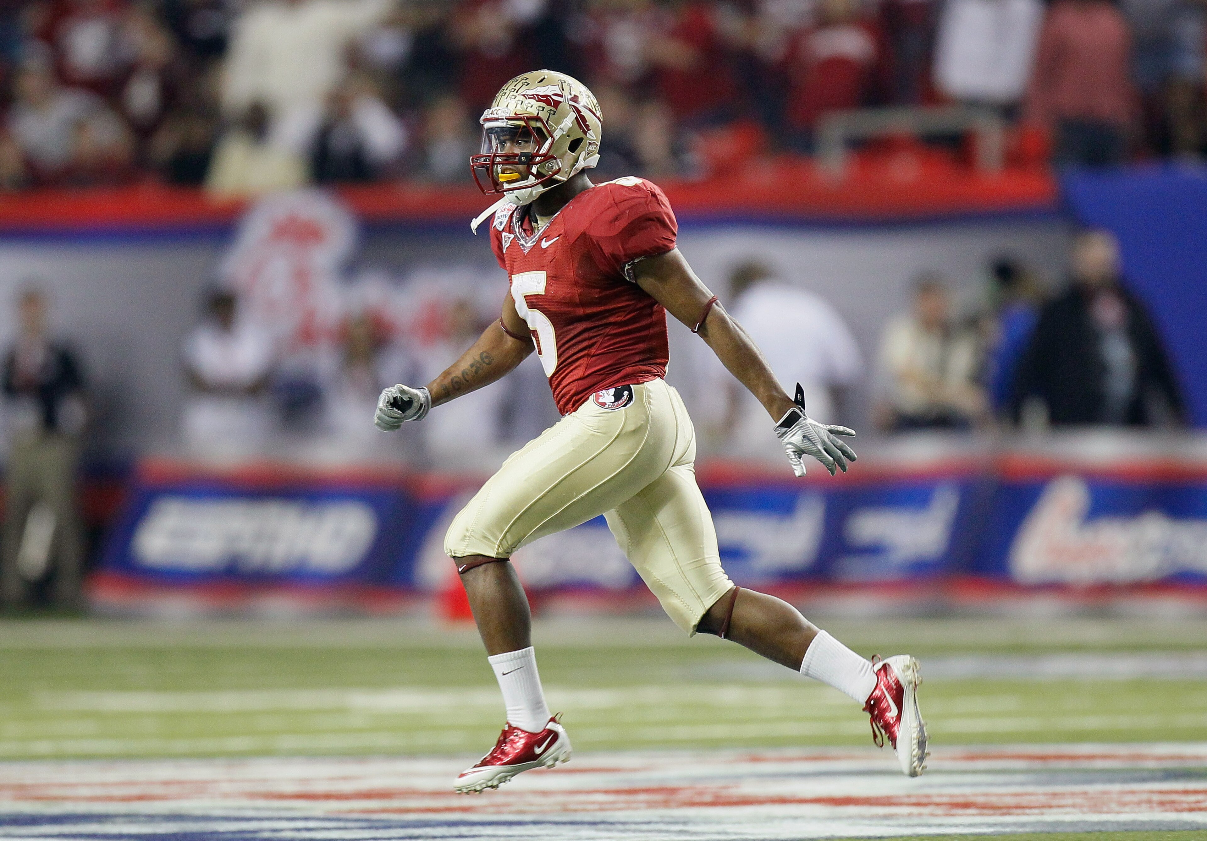 ATLANTA, GA - DECEMBER 31: Greg Reid #5 of the Florida State Seminoles reacts after returning an interception against the South Carolina Gamecocks during the 2010 Chick-fil-A Bowl at Georgia Dome on December 31, 2010 in Atlanta, Georgia. (Photo by Kevin ATLANTA, GA - DECEMBER 31: Greg Reid #5 of the Florida State Seminoles reacts after returning an interception against the South Carolina Gamecocks during the 2010 Chick-fil-A Bowl at Georgia Dome on December 31, 2010 in Atlanta, Georgia. (Photo by Kevin
