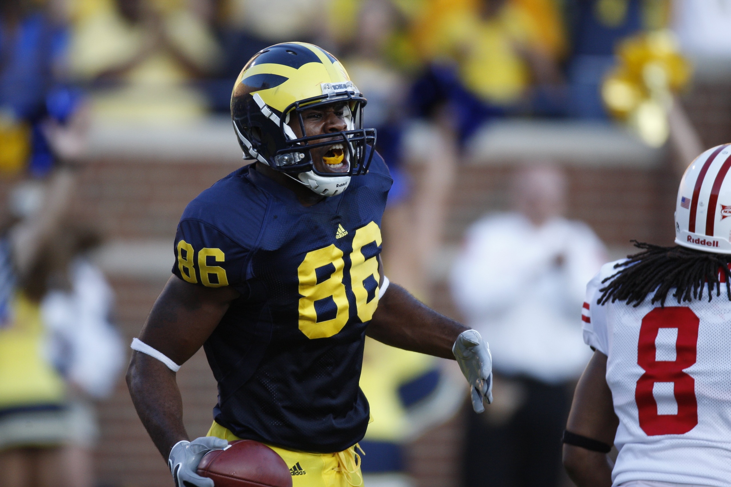 ANN ARBOR, MI - SEPTEMBER 27:  Kevin Koger #86 of the Michigan Wolverines exults during the game against the Wisconsin Badgers on September 27, 2008 at Michigan Stadium in Ann Arbor, Michigan. (Photo by Gregory Shamus/Getty Images)