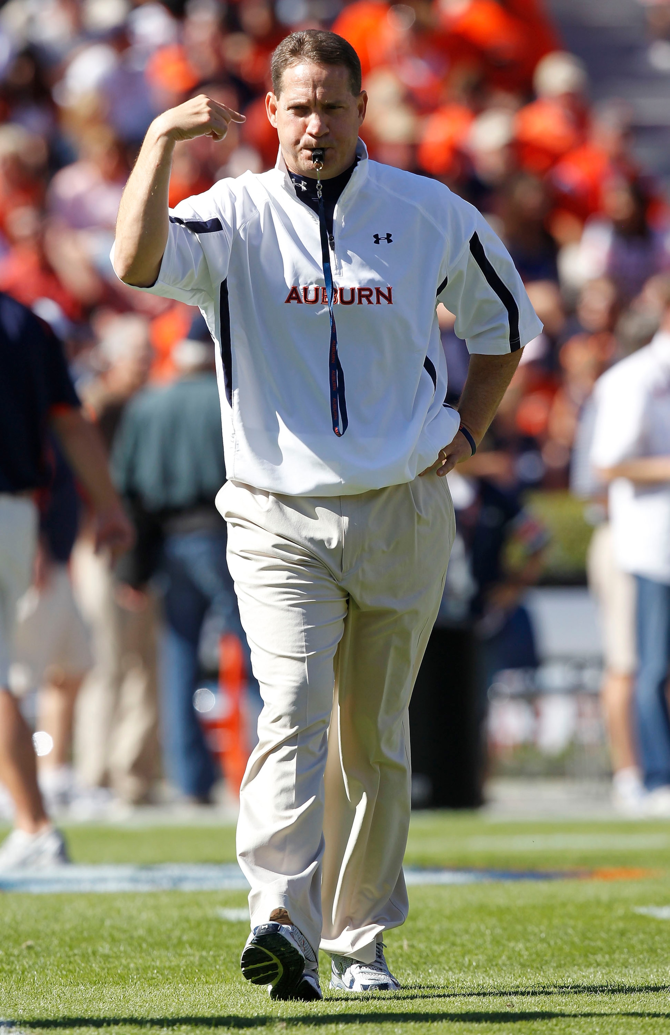 AUBURN - OCTOBER 16: Auburn head coach Gene Chizik blows his whistle during warm ups before the game against the Arkansas Razorbacks at Jordan-Hare Stadium on October 16, 2010 in Auburn, Alabama. (Photo by Mike Zarrilli/Getty Images) AUBURN - OCTOBER 16: Auburn head coach Gene Chizik blows his whistle during warm ups before the game against the Arkansas Razorbacks at Jordan-Hare Stadium on October 16, 2010 in Auburn, Alabama. (Photo by Mike Zarrilli/Getty Images)
