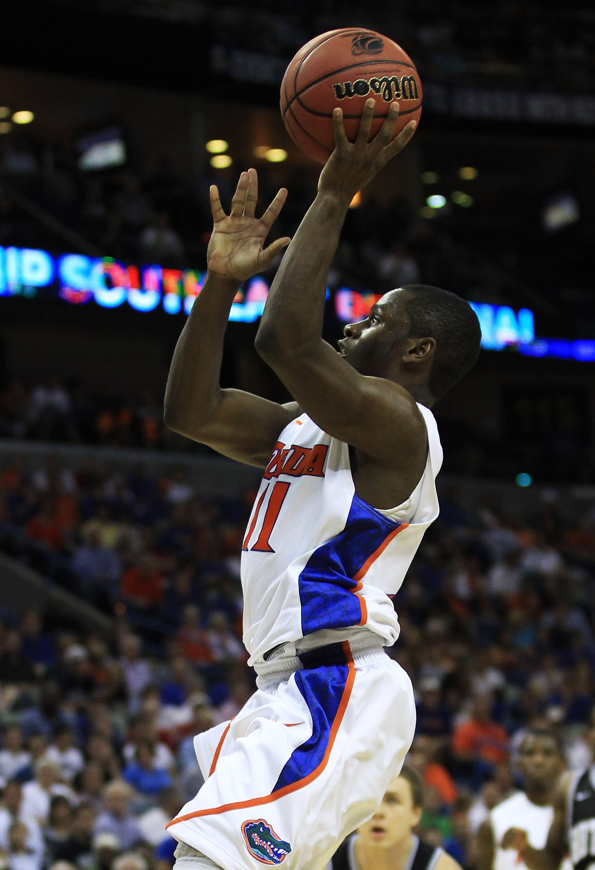 NEW ORLEANS, LA - MARCH 26:  Erving Walker #11 of the Florida Gators shoots against the Butler Bulldogs during the Southeast regional final of the 2011 NCAA men's basketball tournament at New Orleans Arena on March 26, 2011 in New Orleans, Louisiana.  (Ph