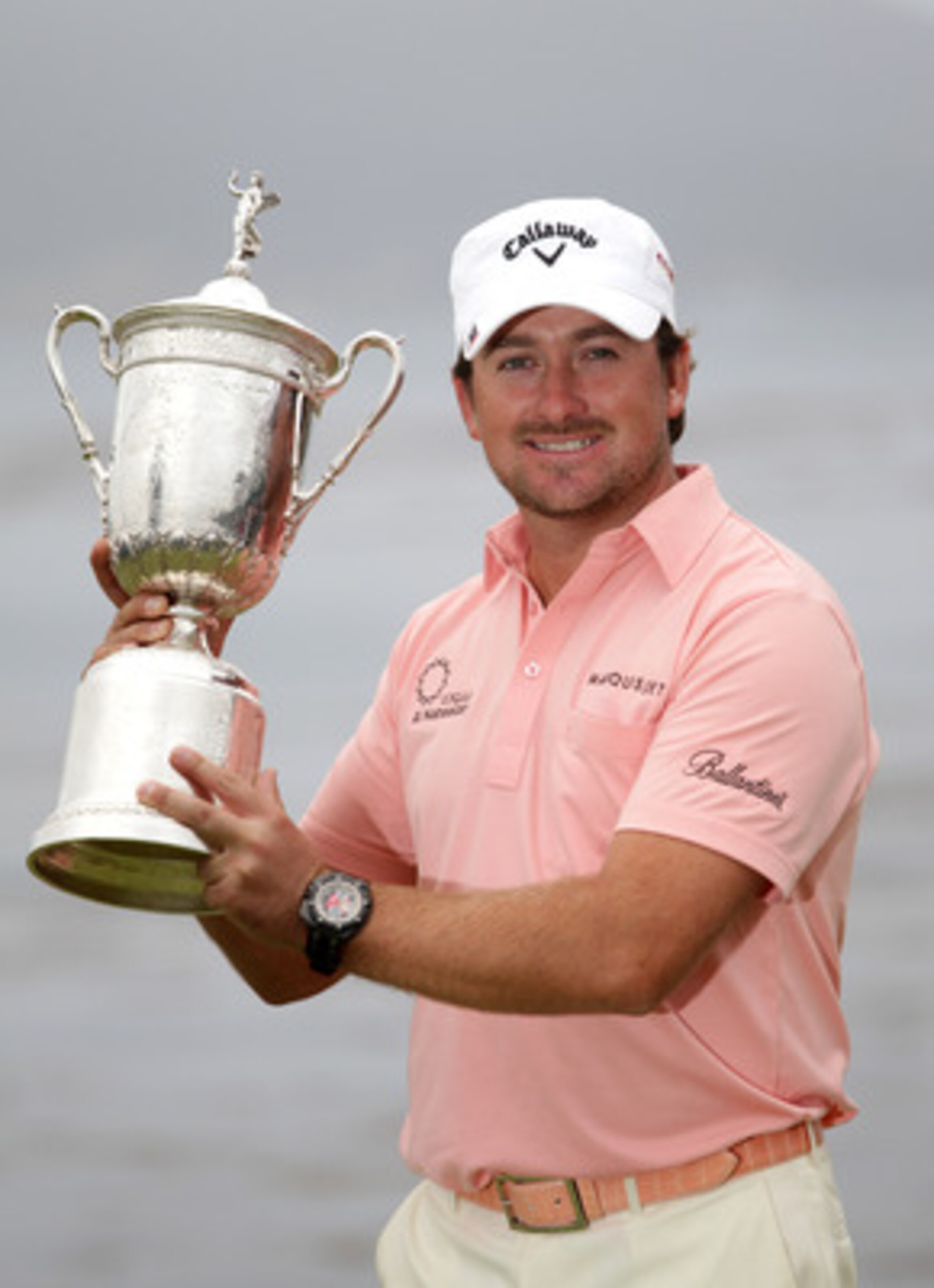 PEBBLE BEACH,CA - JUNE 20: Graeme McDowell of Northern Ireland  celebrates with the trophy on the 18th green after winning the 110th U.S. Open at Pebble Beach Golf Links on June 20,2010 in Pebble Barch, California. (Photo by Andrew Redington/Getty Images)