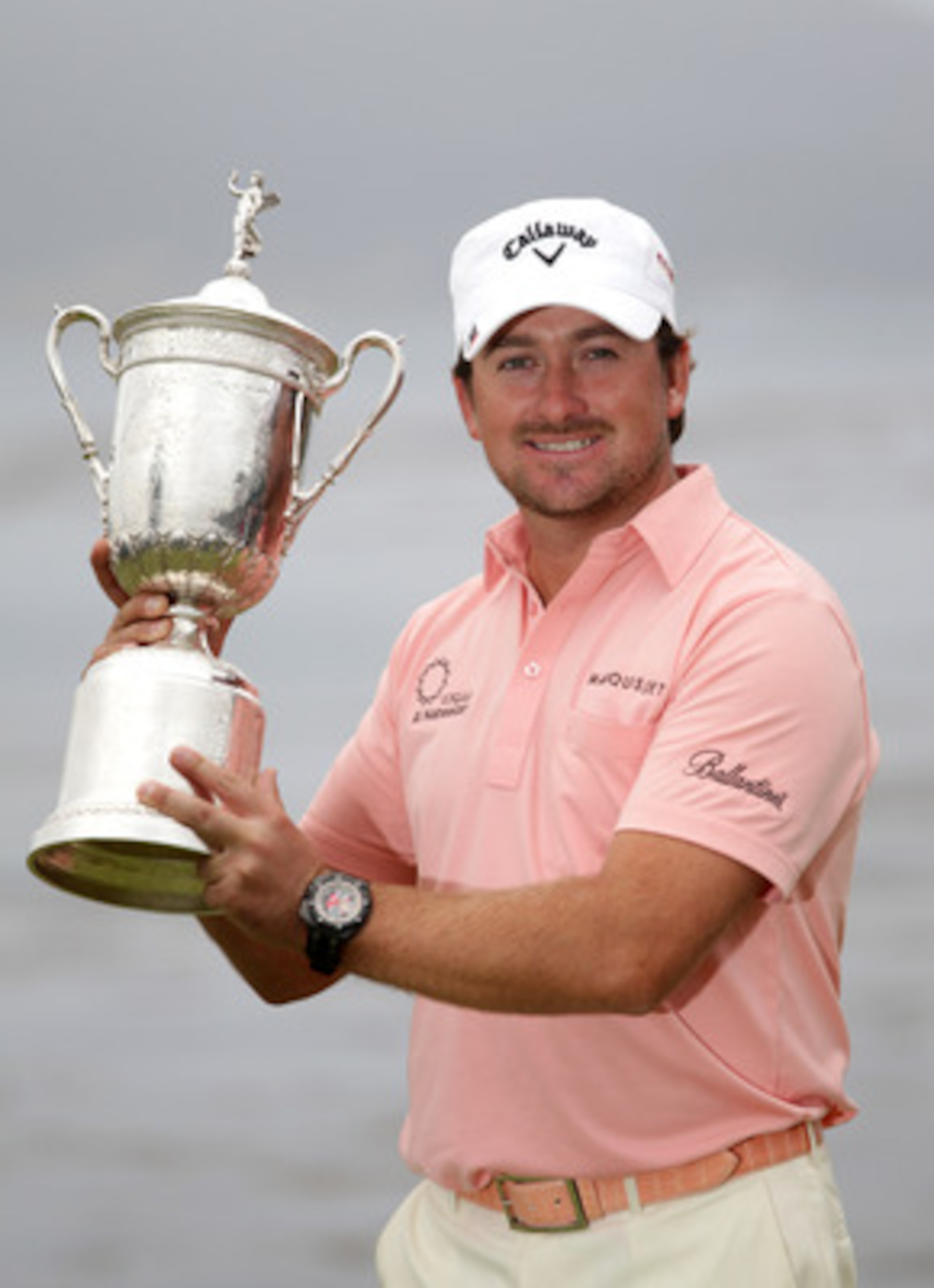 PEBBLE BEACH,CA - JUNE 20: Graeme McDowell of Northern Ireland  celebrates with the trophy on the 18th green after winning the 110th U.S. Open at Pebble Beach Golf Links on June 20,2010 in Pebble Barch, California. (Photo by Andrew Redington/Getty Images)