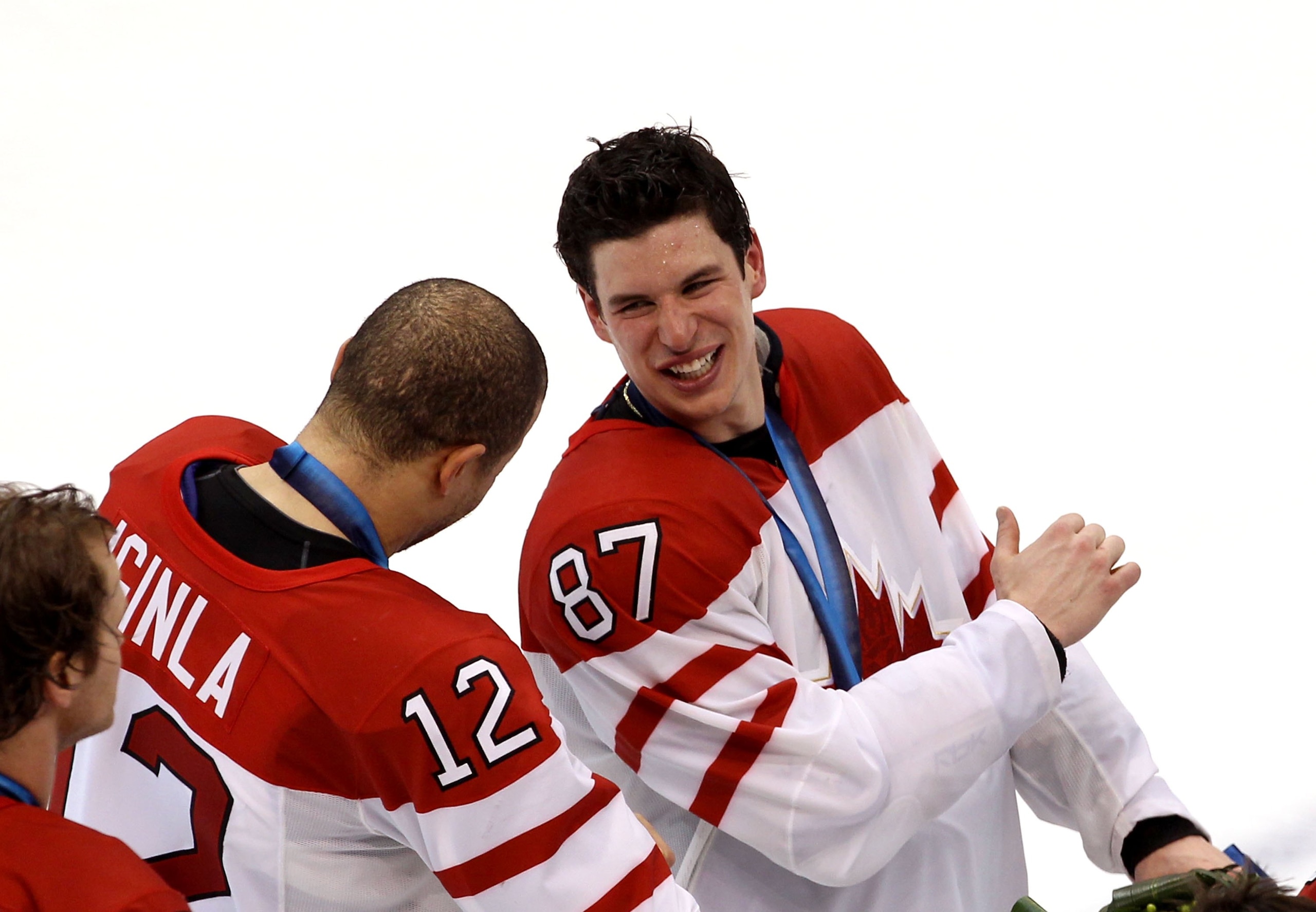 VANCOUVER, BC - FEBRUARY 28:  Sidney Crosby #87 of Canada smiles along with Jarome Iginla #12 after the ice hockey men's gold medal game between USA and Canada on day 17 of the Vancouver 2010 Winter Olympics at Canada Hockey Place on February 28, 2010 in