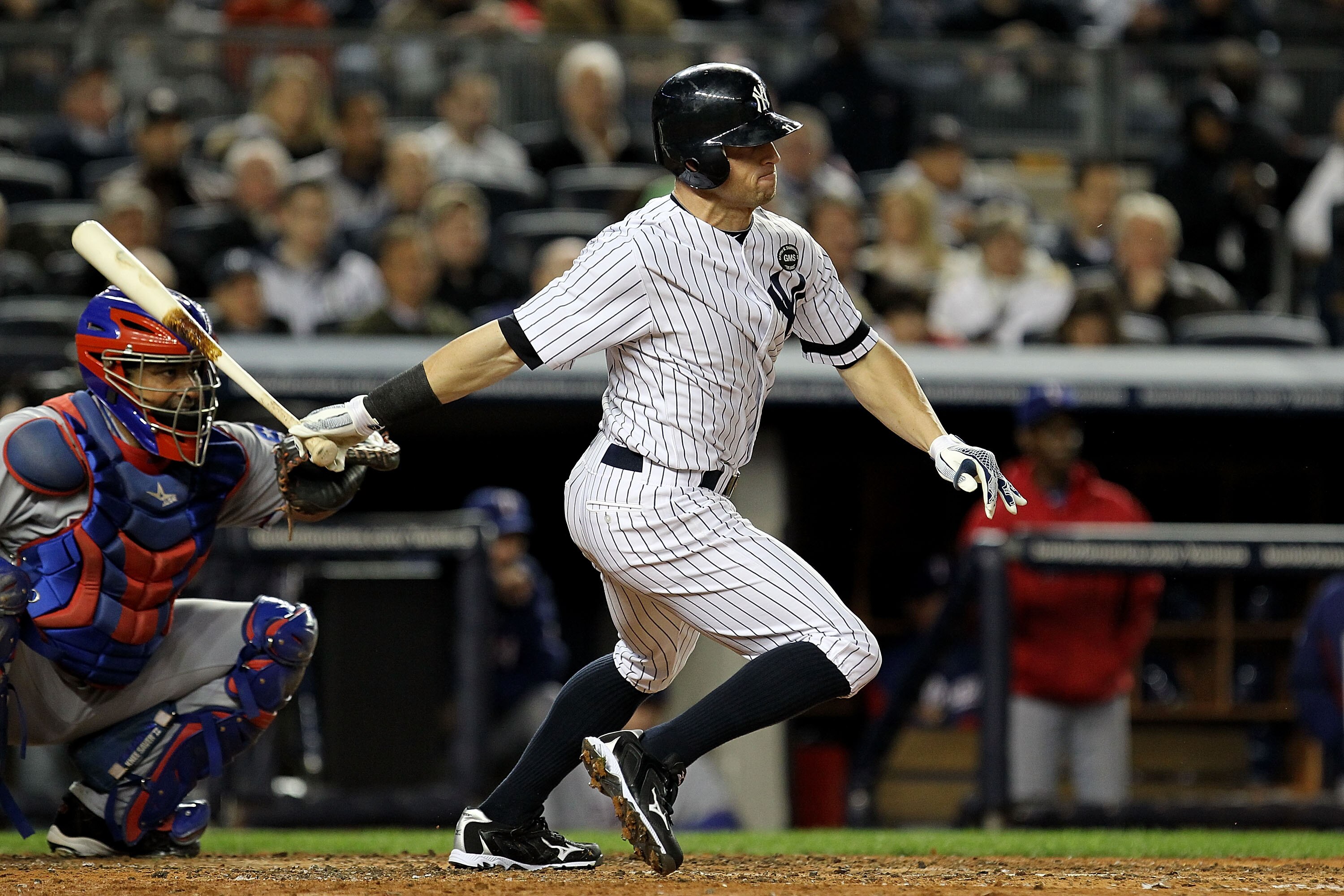 NEW YORK - OCTOBER 18:  Brett Gardner #11 of the New York Yankees bats against the Texas Rangers in Game Three of the ALCS during the 2010 MLB Playoffs at Yankee Stadium on October 18, 2010 in New York, New York. The Rangers won 8-0. (Photo by Al Bello/Ge