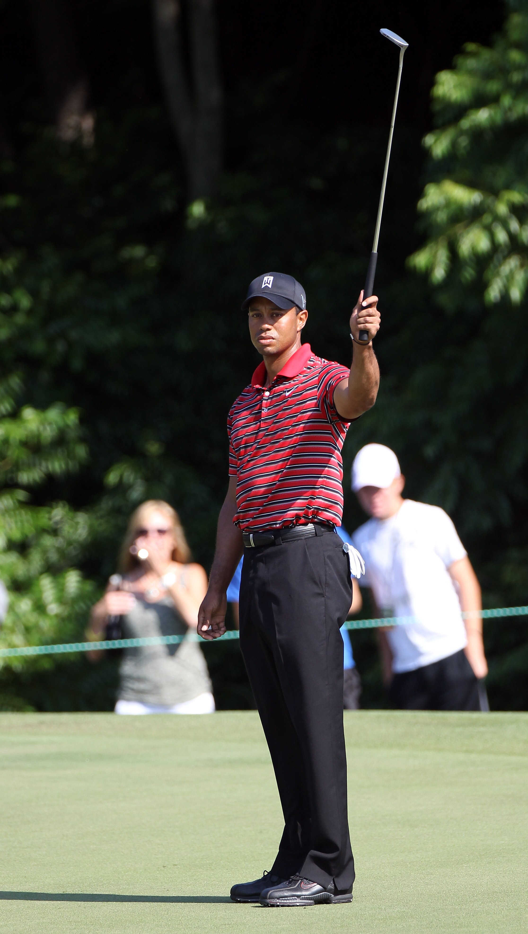 ORLANDO, FL - MARCH 27:  Tiger Woods reacts to a putt on the 2nd hole during the final round of the Arnold Palmer Invitational presented by MasterCard at the Bay Hill Club and Lodge on March 27, 2011 in Orlando, Florida.  (Photo by Sam Greenwood/Getty Ima