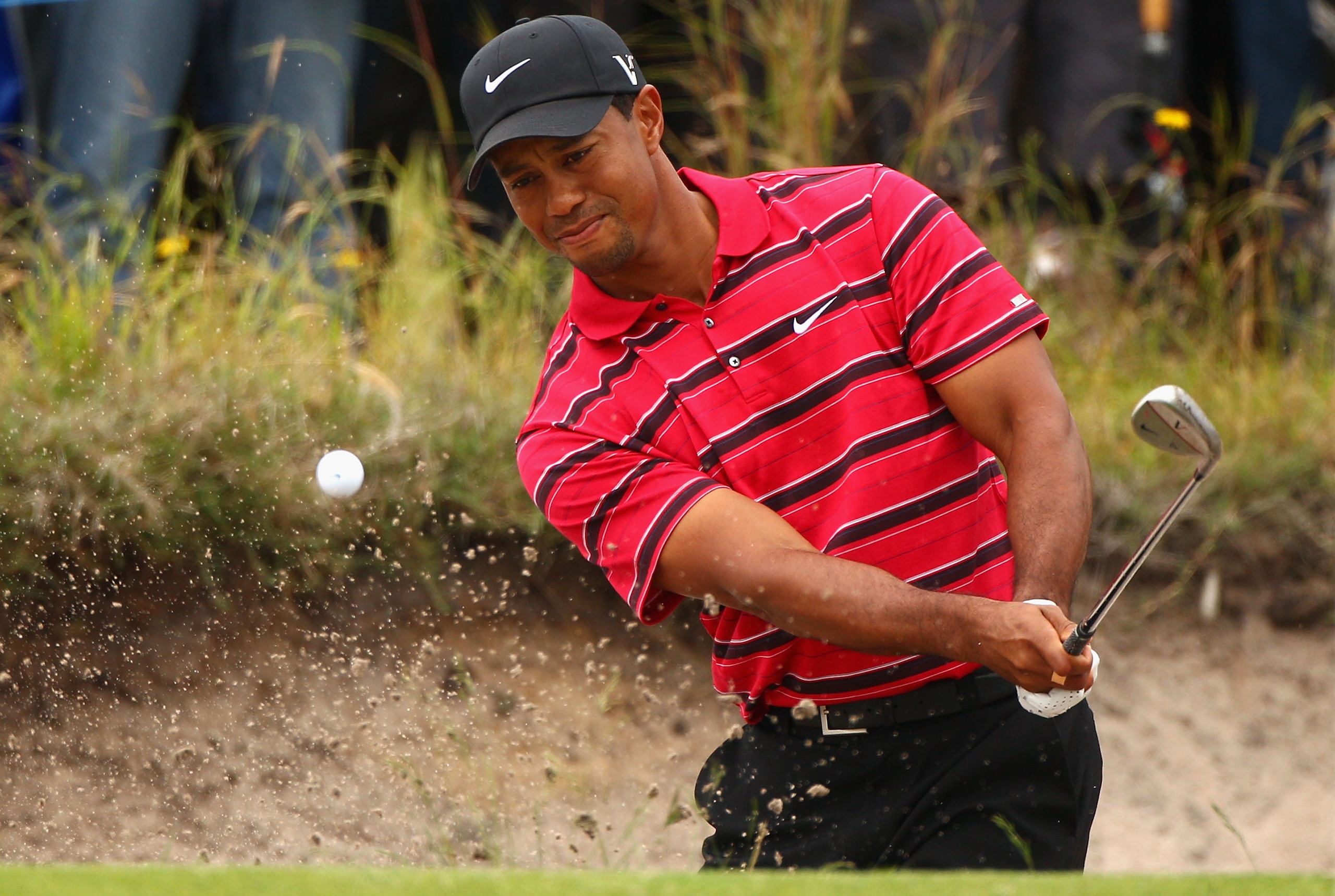 MELBOURNE, AUSTRALIA - NOVEMBER 14: Tiger Woods of the USA chips in out of the bunker on the 2nd hole during round four of the Australian Masters at The Victoria Golf Club on November 14, 2010 in Melbourne, Australia. (Photo by Ryan Pierse/Getty Images) MELBOURNE, AUSTRALIA - NOVEMBER 14: Tiger Woods of the USA chips in out of the bunker on the 2nd hole during round four of the Australian Masters at The Victoria Golf Club on November 14, 2010 in Melbourne, Australia. (Photo by Ryan Pierse/Getty Images)