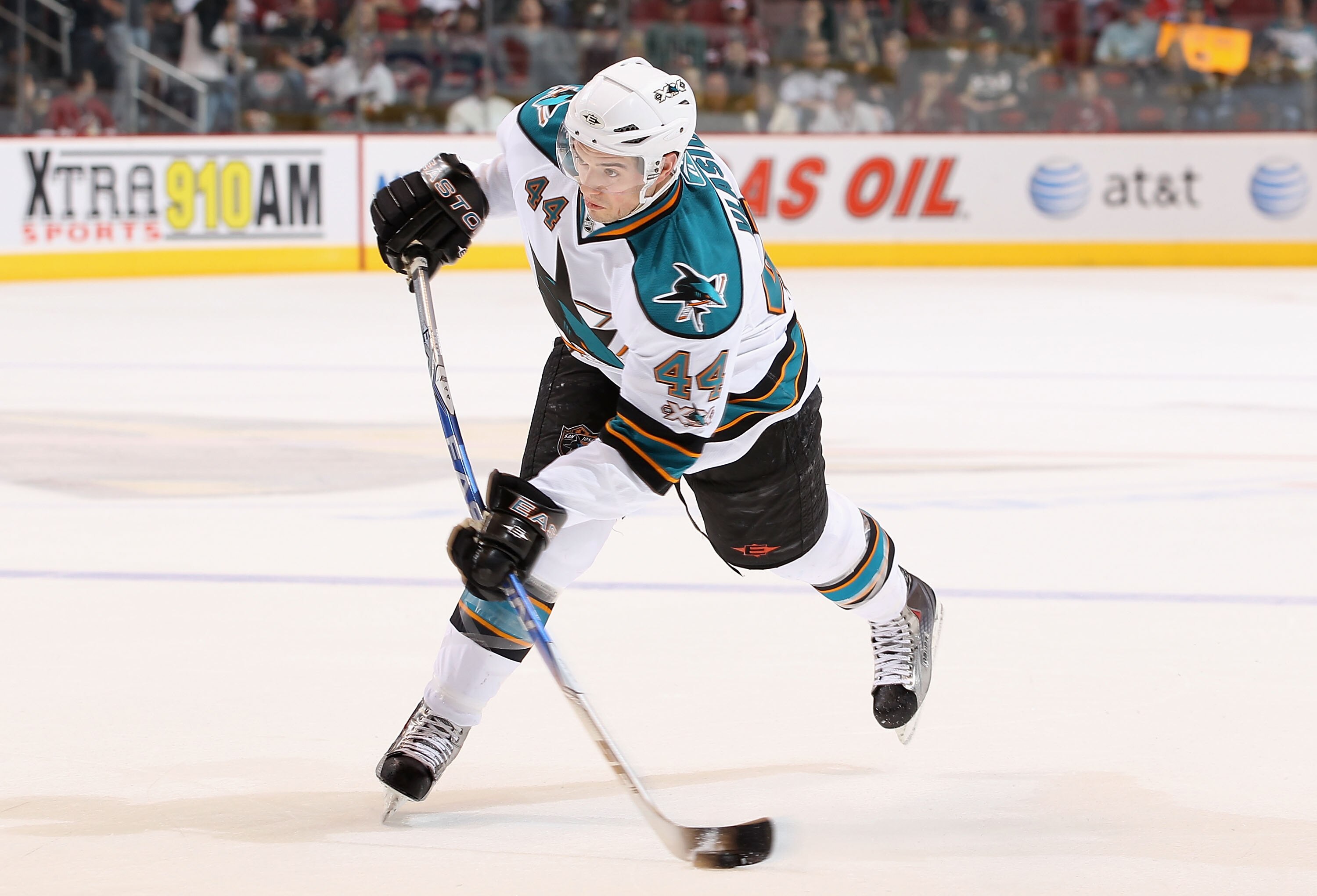 GLENDALE, AZ - MARCH 26:  Marc-Edouard Vlasic #44 of the San Jose Sharks shoots the puck during the NHL game against the Phoenix Coyotes at Jobing.com Arena on March 26, 2011 in Glendale, Arizona. The Sharks defeated the Coyotes 4-1.  (Photo by Christian
