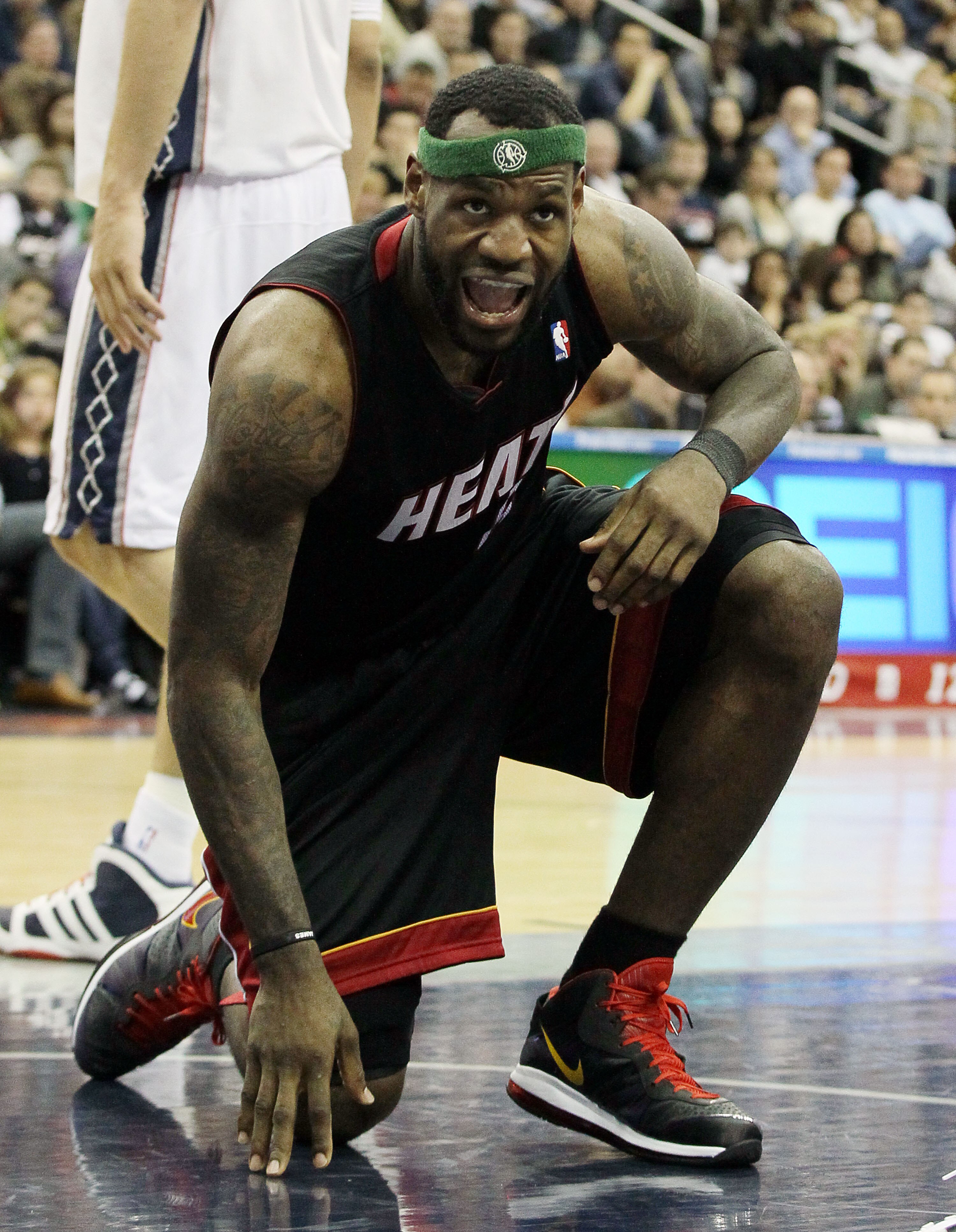 NEWARK, NJ - APRIL 03:  LeBron James #6 of the Miami Heat looks on against the New Jersey Nets at the Prudential Center on April 3, 2011 in Newark, New Jersey.The Heat defeated the Nets 108-94.NOTE TO USER: User expressly acknowledges and agrees that, by