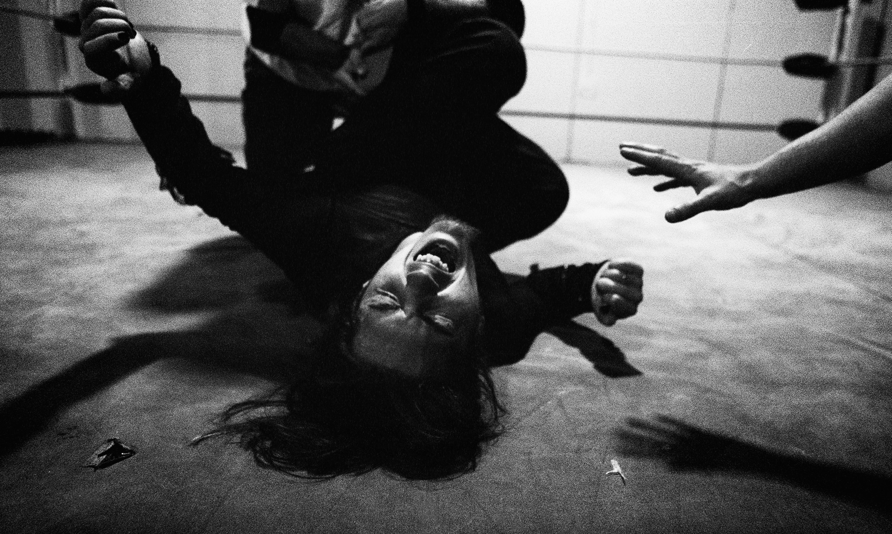 SYDNEY, AUSTRALIA - JULY 16: Zander Bathory screams out in pain after being put in a leg lock by the European Assassin during the AWF Dojo Wrestling night July 16, 2004 in Sydney, Australia. For this group of die-hard sports professionals who spend most S