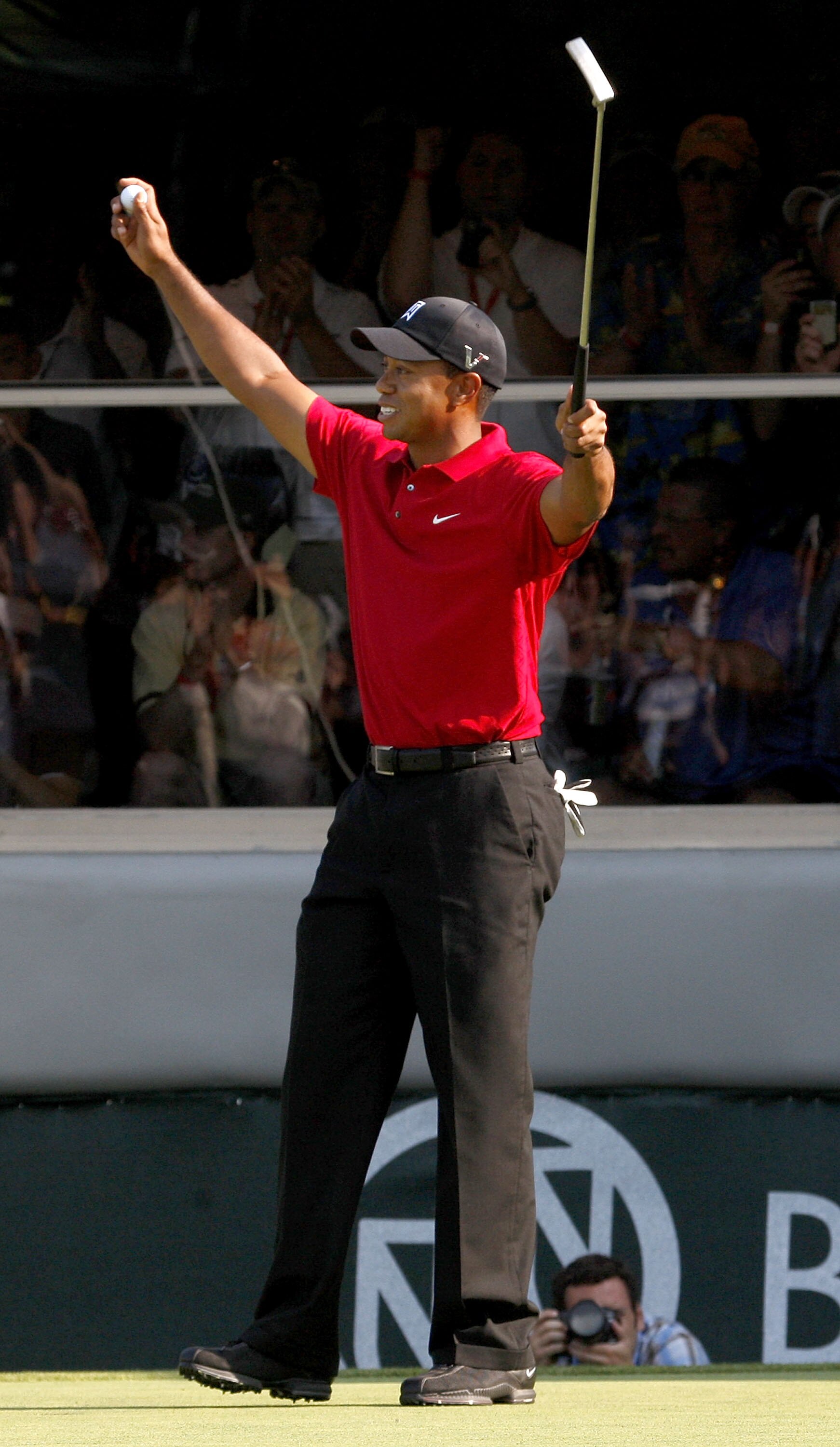 GRAND BLANC, MI - AUGUST 02: Tiger Woods reacts after winning the 2009 Buick Open at Warwick Hills Golf and Country Club on August 2, 2009 in Grand Blanc, Michigan.  (Photo by Gregory Shamus/Getty Images)