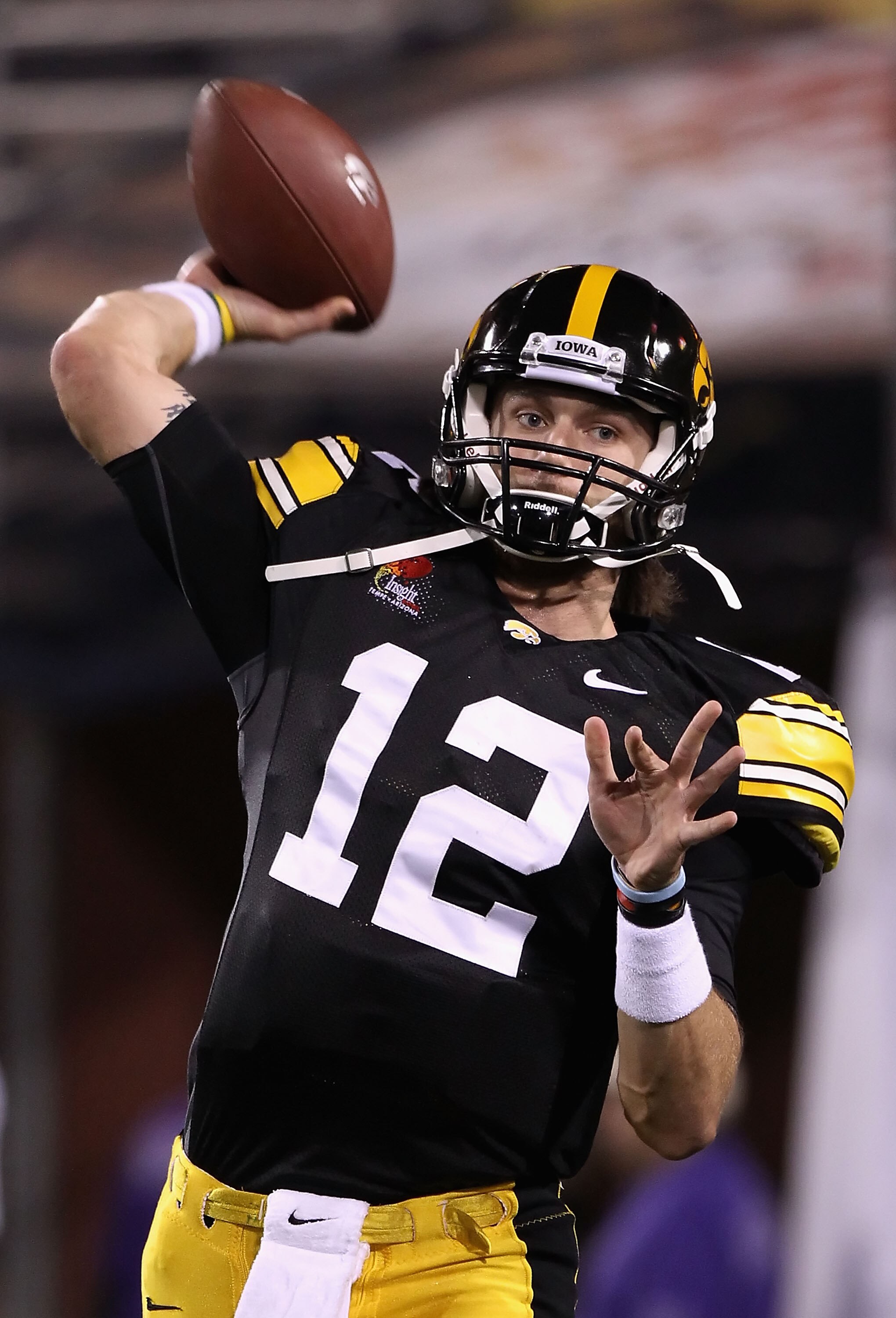 TEMPE, AZ - DECEMBER 28: Quarterback Ricky Stanzi #12 of the Iowa Hawkeyes warms up before the Insight Bowl against the Missouri Tigers at Sun Devil Stadium on December 28, 2010 in Tempe, Arizona. (Photo by Christian Petersen/Getty Images) TEMPE, AZ - DECEMBER 28: Quarterback Ricky Stanzi #12 of the Iowa Hawkeyes warms up before the Insight Bowl against the Missouri Tigers at Sun Devil Stadium on December 28, 2010 in Tempe, Arizona. (Photo by Christian Petersen/Getty Images)